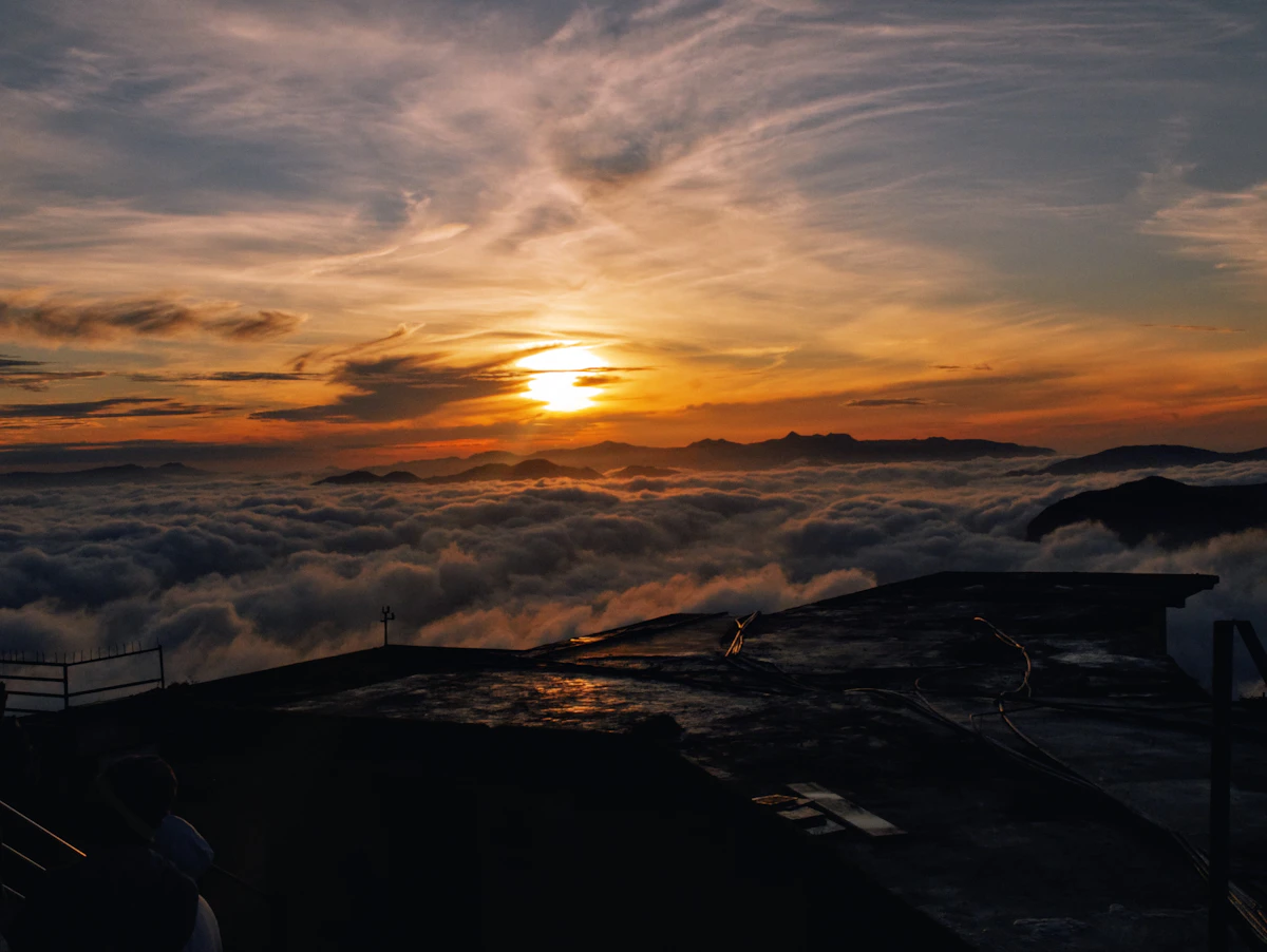 Warm mountain light above the clouds at Adam’s Peak