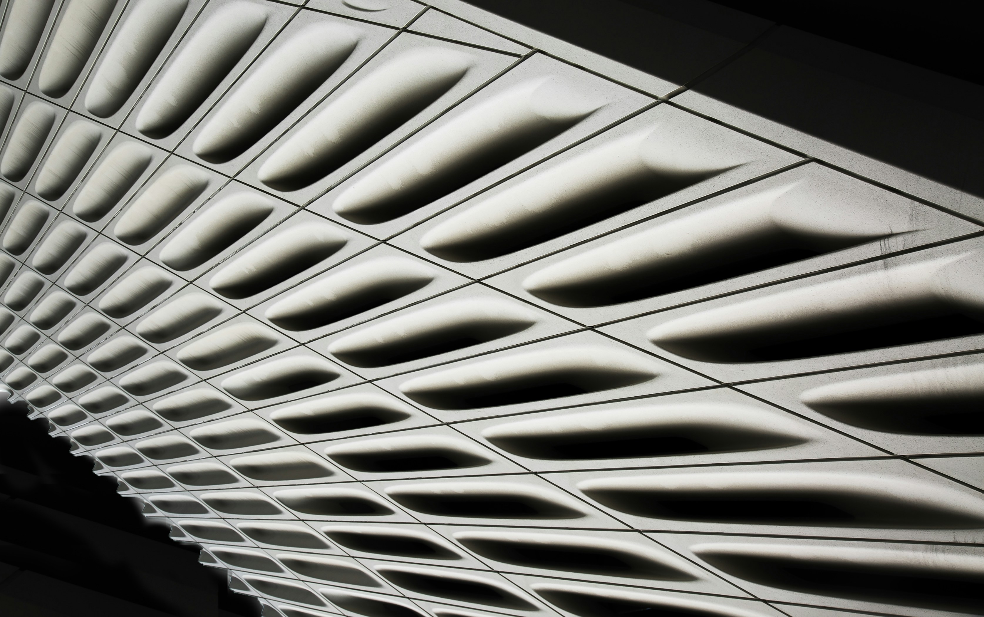 Modern architectural facade with repeating geometric pattern