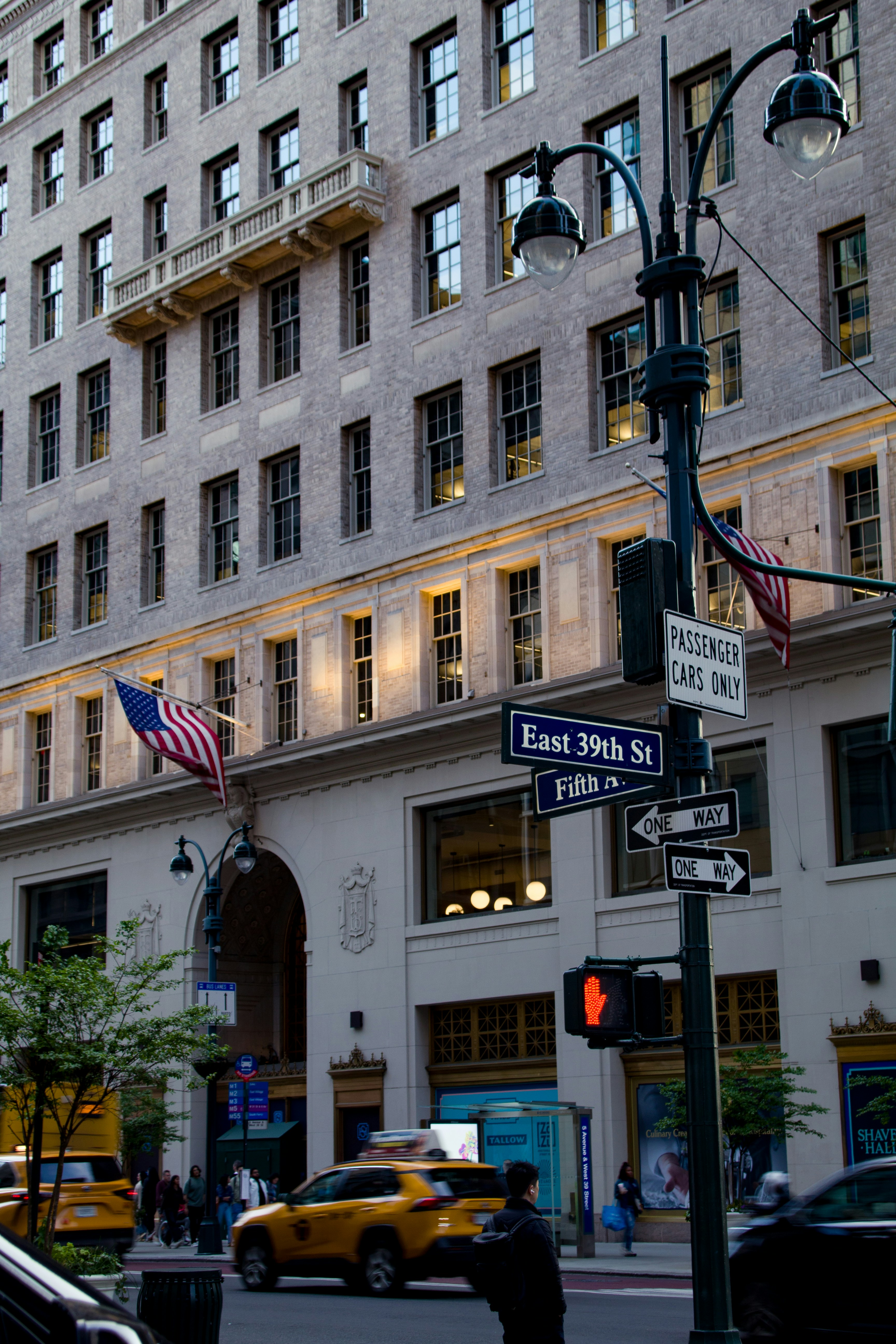 New york city street with yellow taxis and buildings.