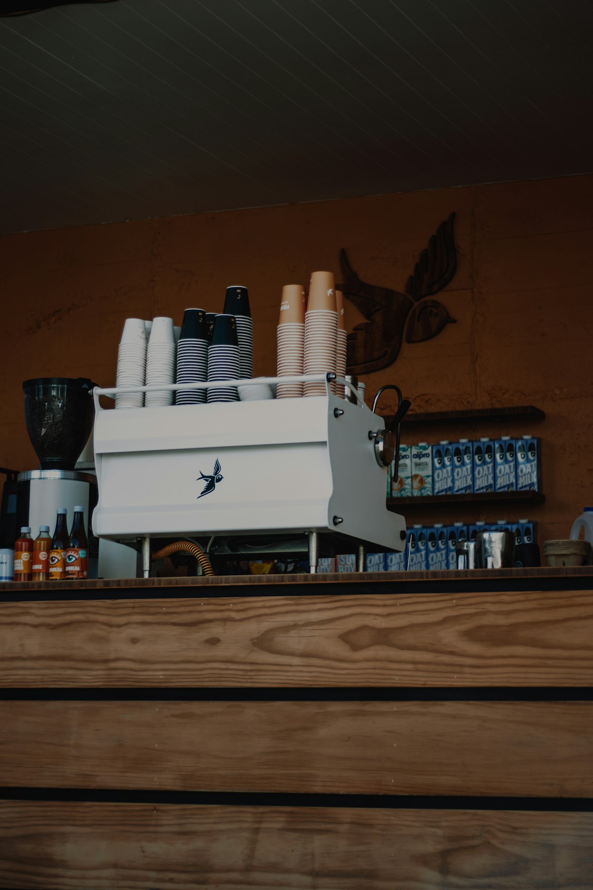 Espresso machine with cups and coffee supplies — preparing your capsule coffee product line for China market entry