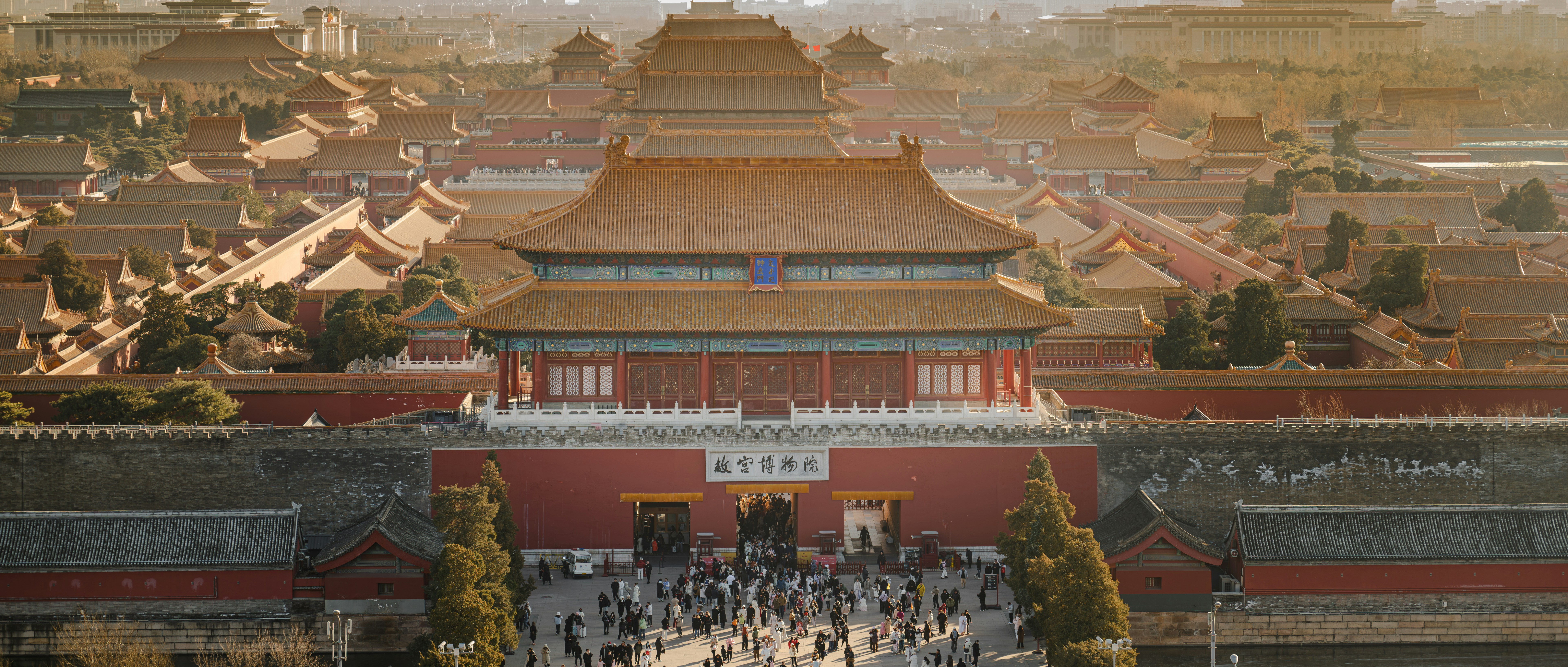 Crowds gather at the entrance to the forbidden city complex