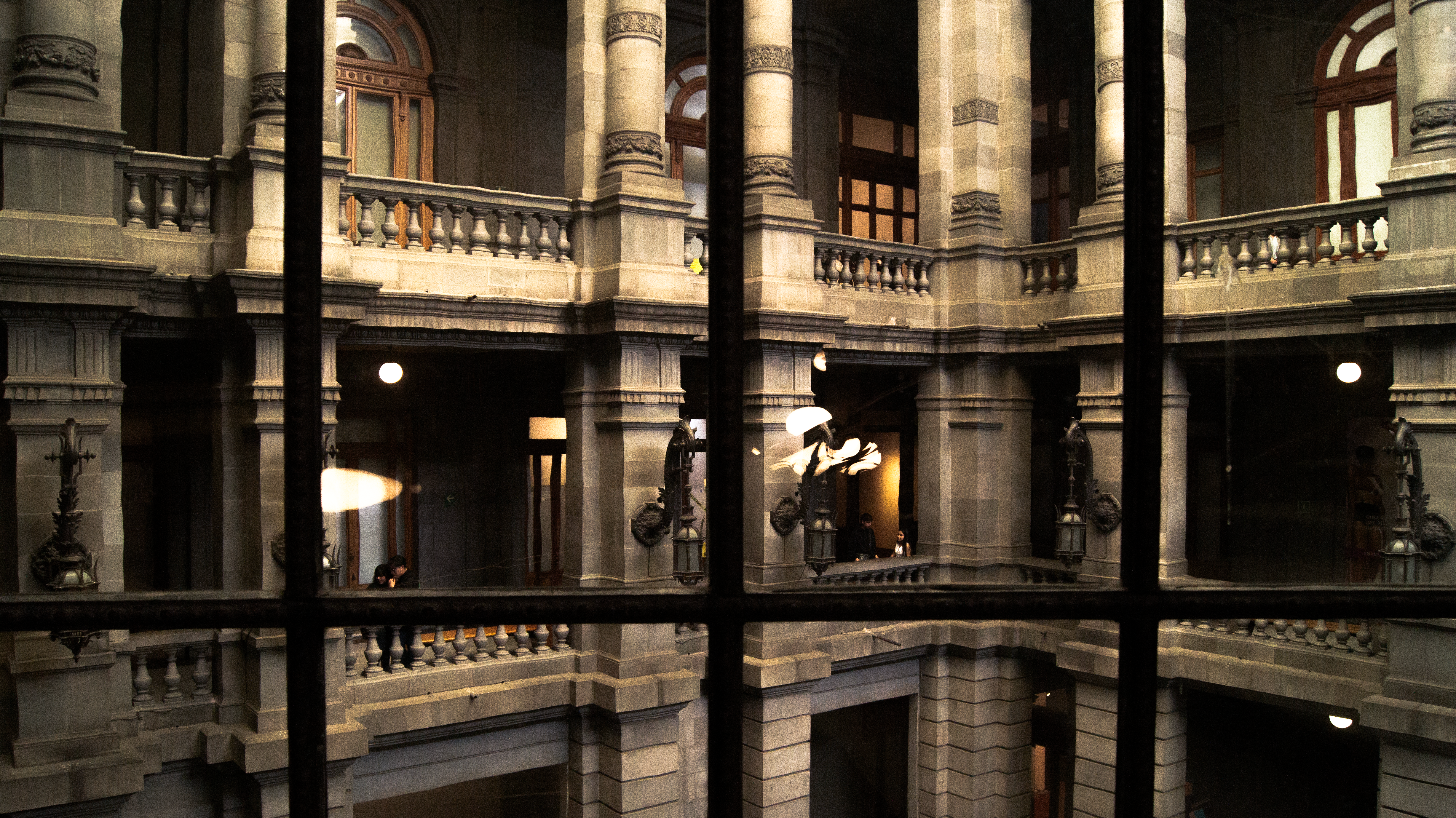 Interior courtyard of a grand building with ornate architecture.
