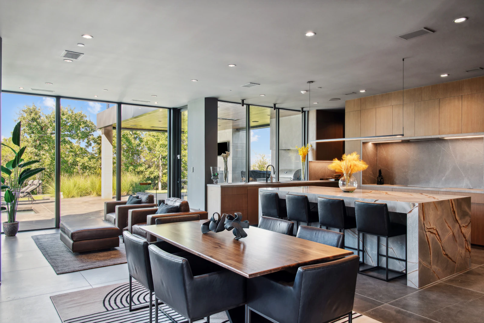 Open-plan living room and kitchen with smart lighting