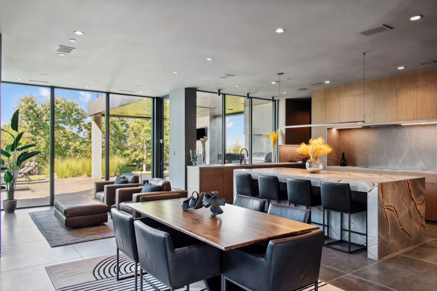 Open-plan living room and kitchen with smart lighting
