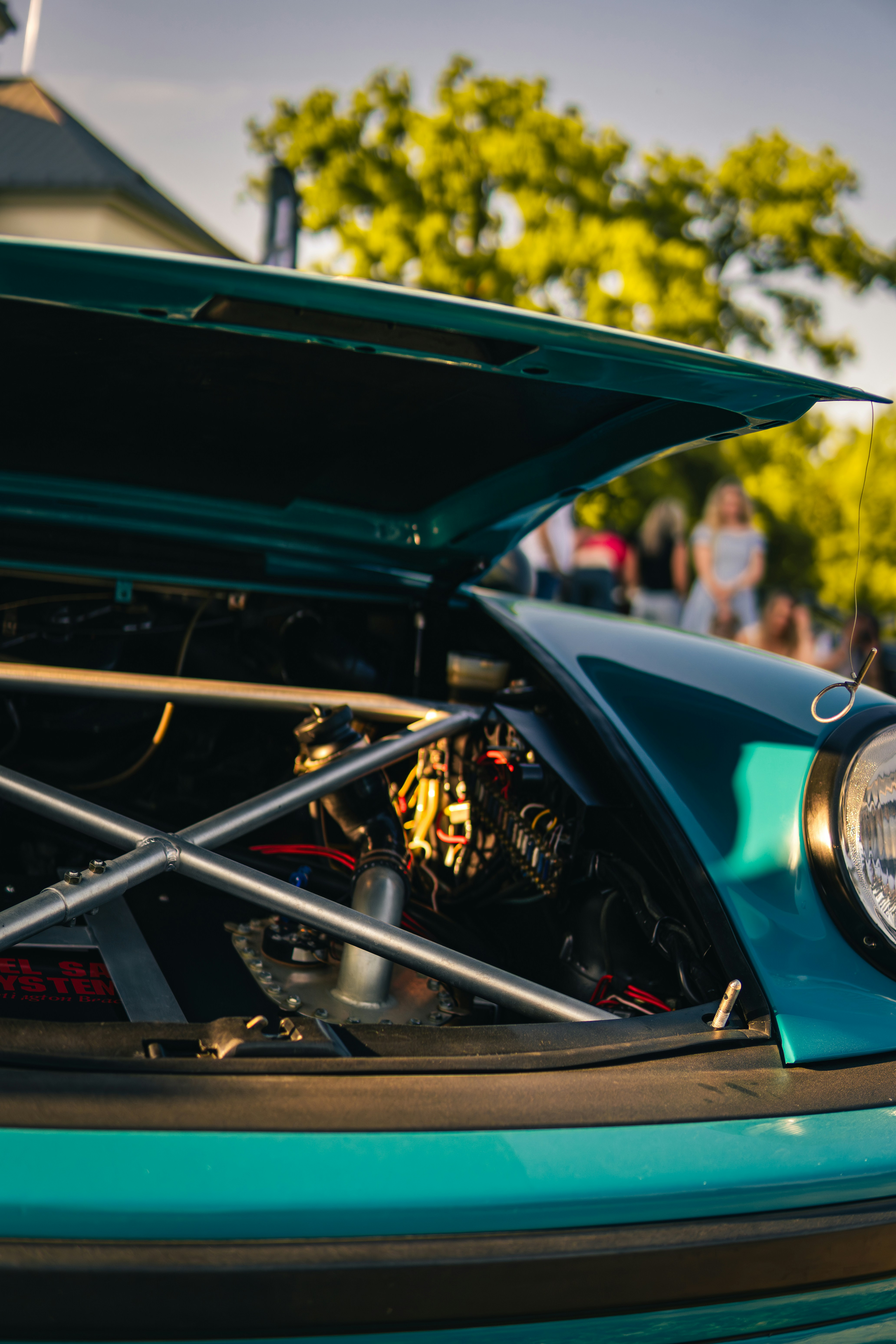 Teal car engine compartment with metal bracing. photo – Free Porsche ...