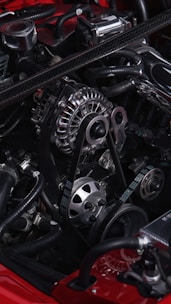 Close-up of a car's engine with chrome alternator.