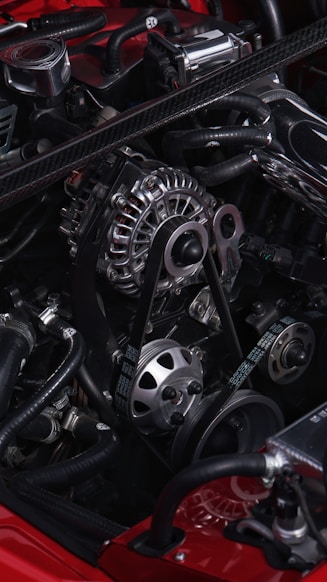 Close-up of a car's engine with chrome alternator.