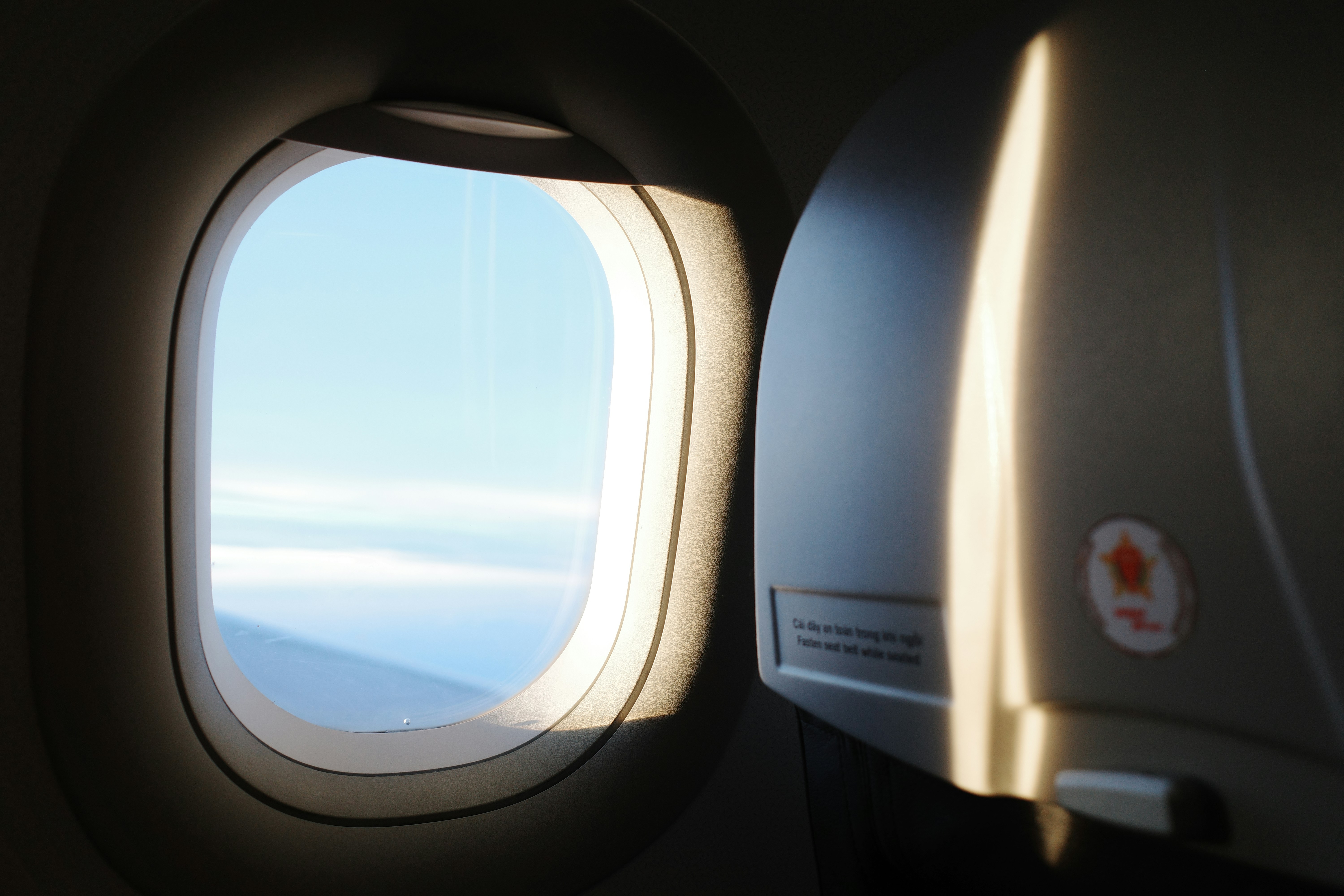 View from an airplane window at sunrise.