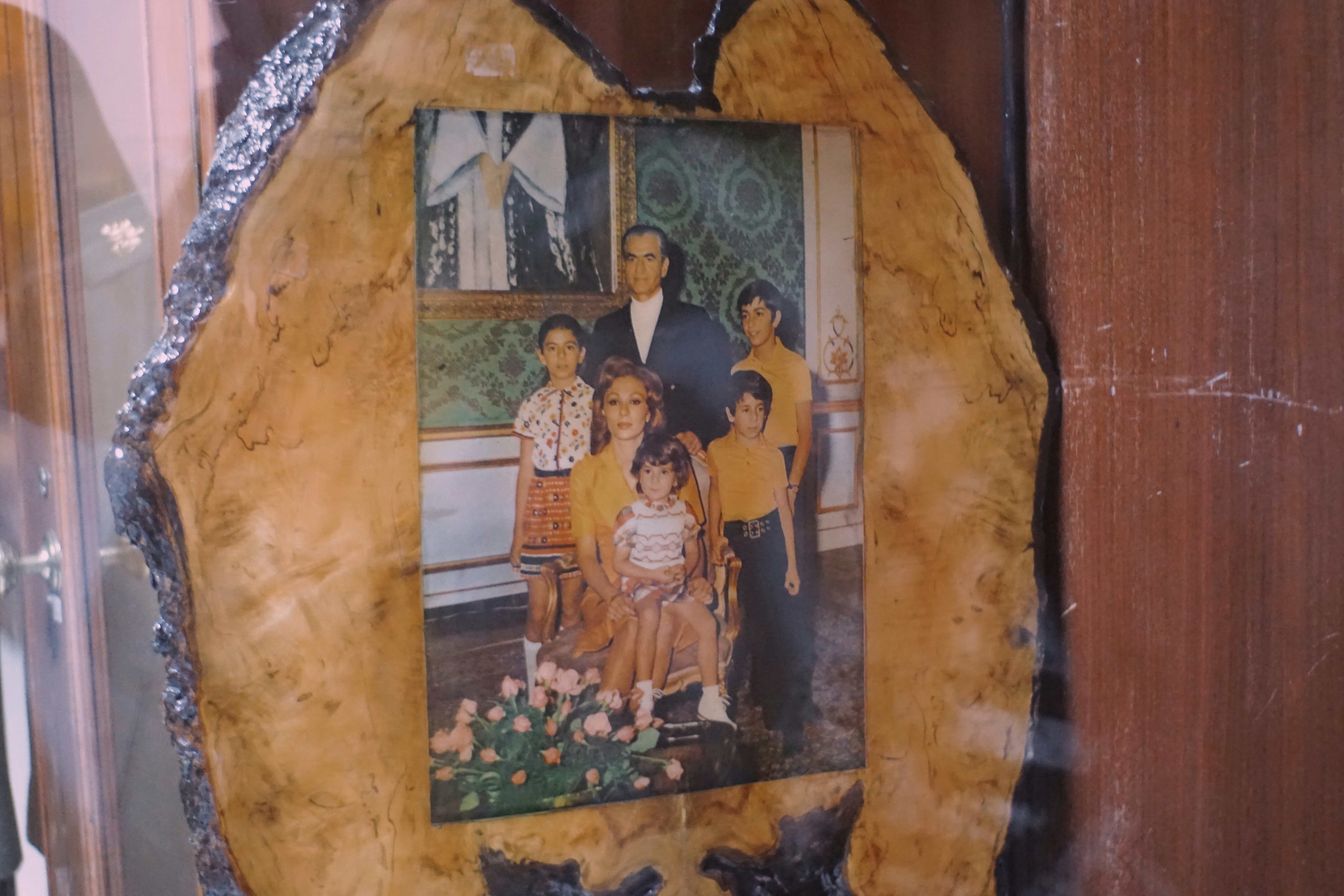 Family portrait in a decorative wooden frame