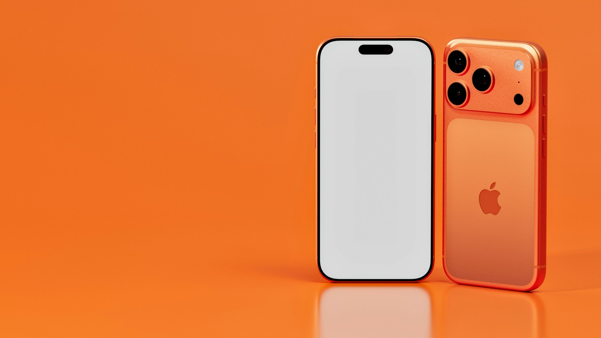 Two orange smartphones on an orange background.