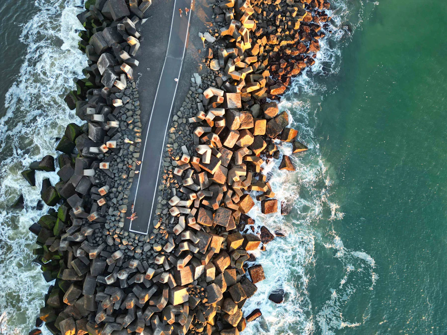 Concrete seawall holding back ocean waves