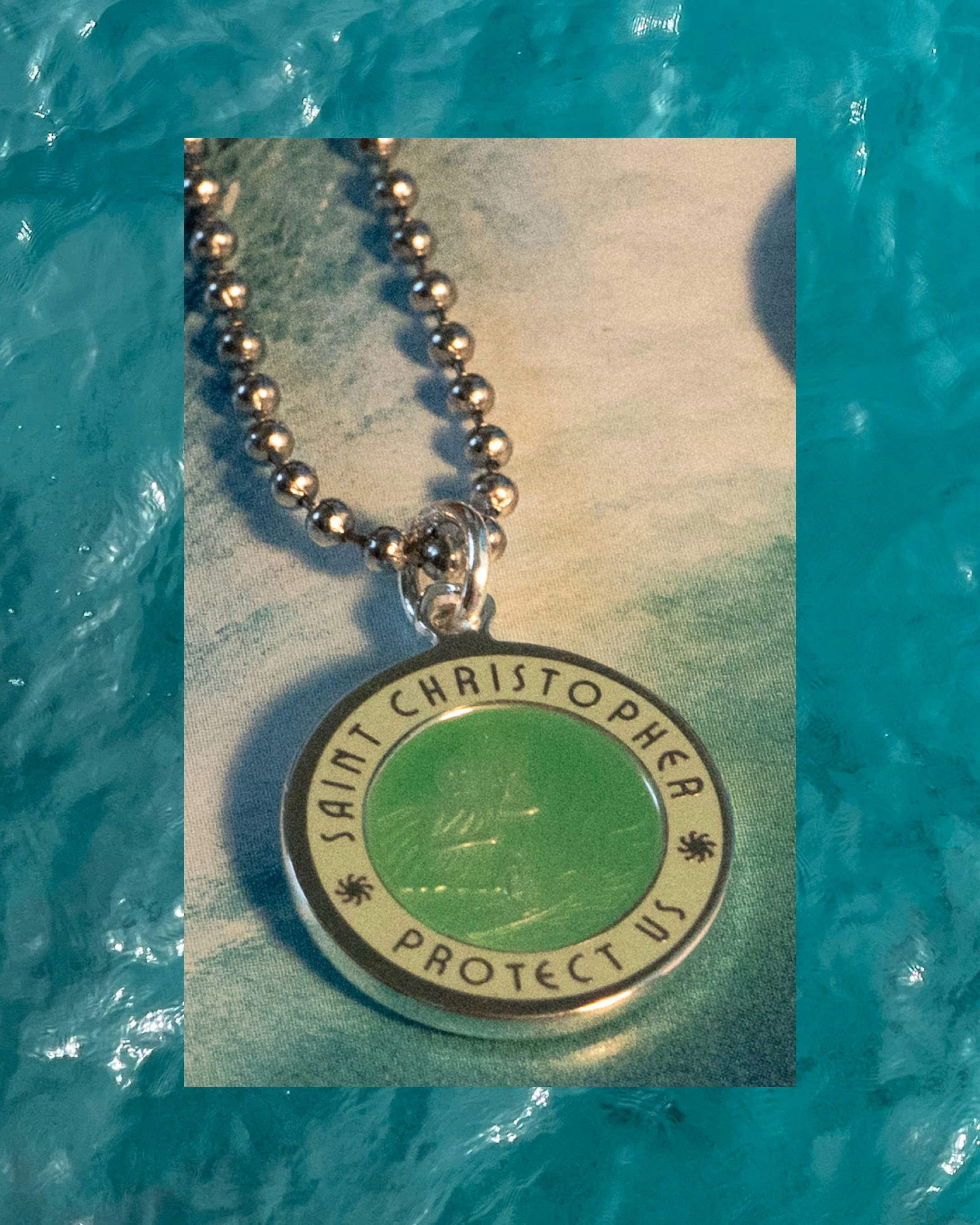 Saint christopher medal on a beaded necklace