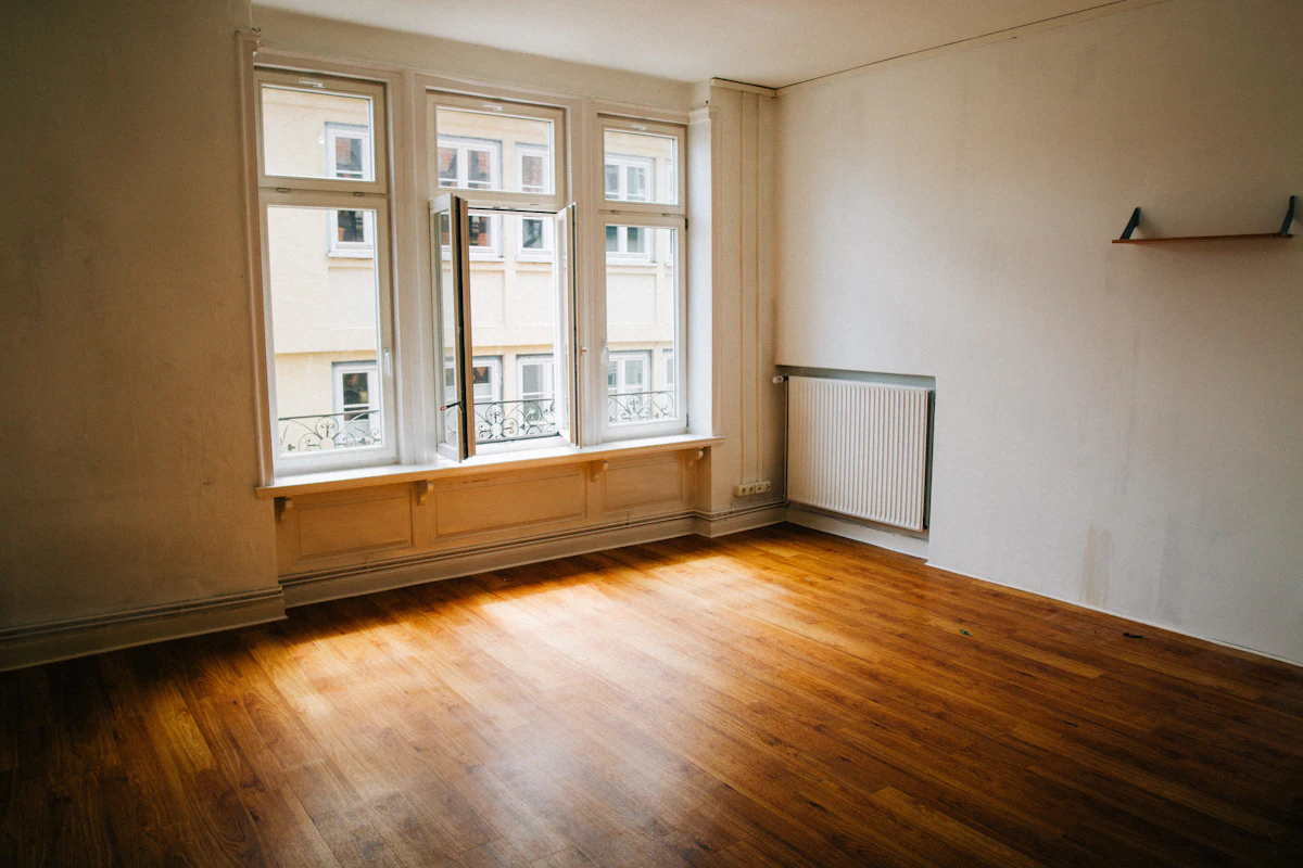 Office room with undressed windows before blinds are fitted