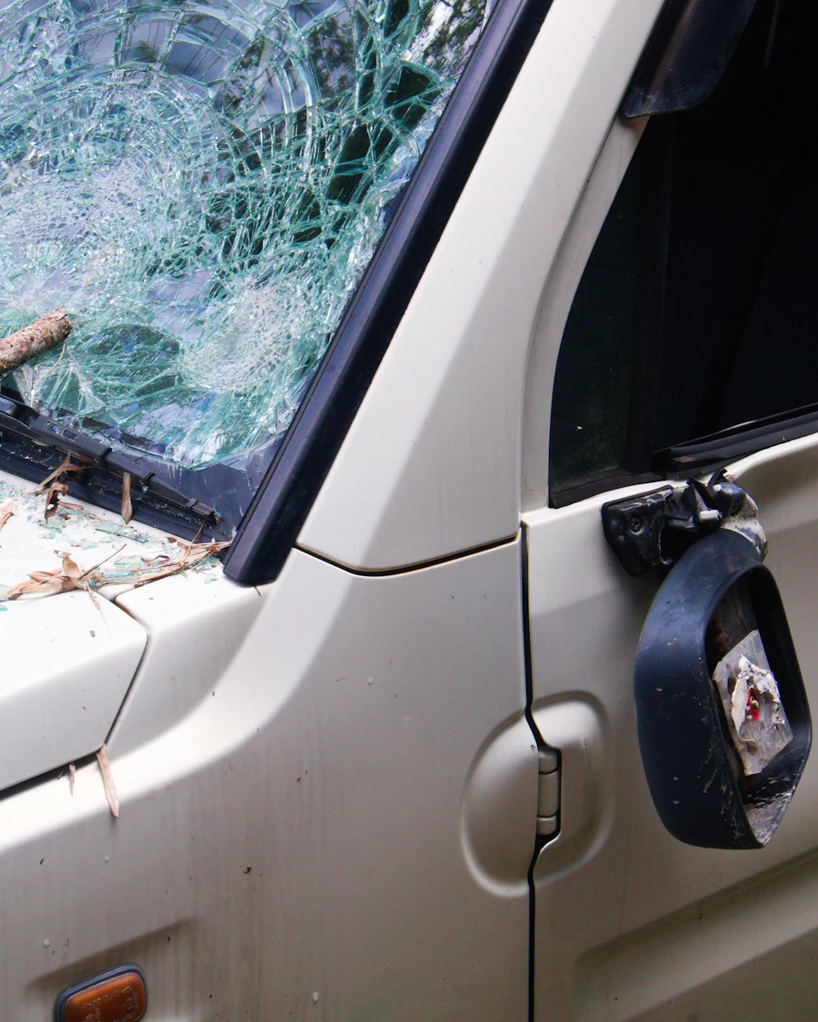 Car with a shattered windshield needing replacement