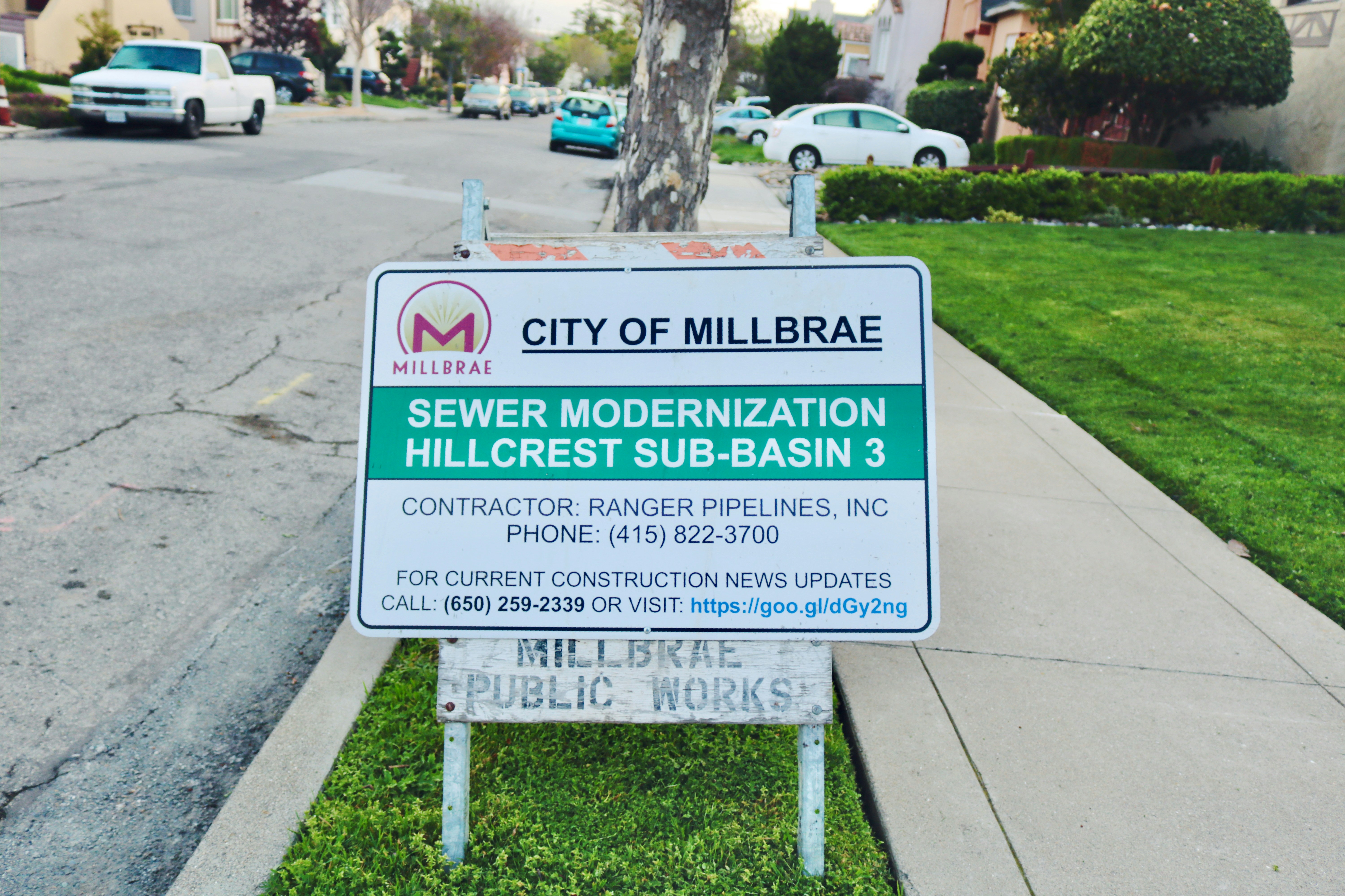 City of millbrae sewer modernization sign on street.