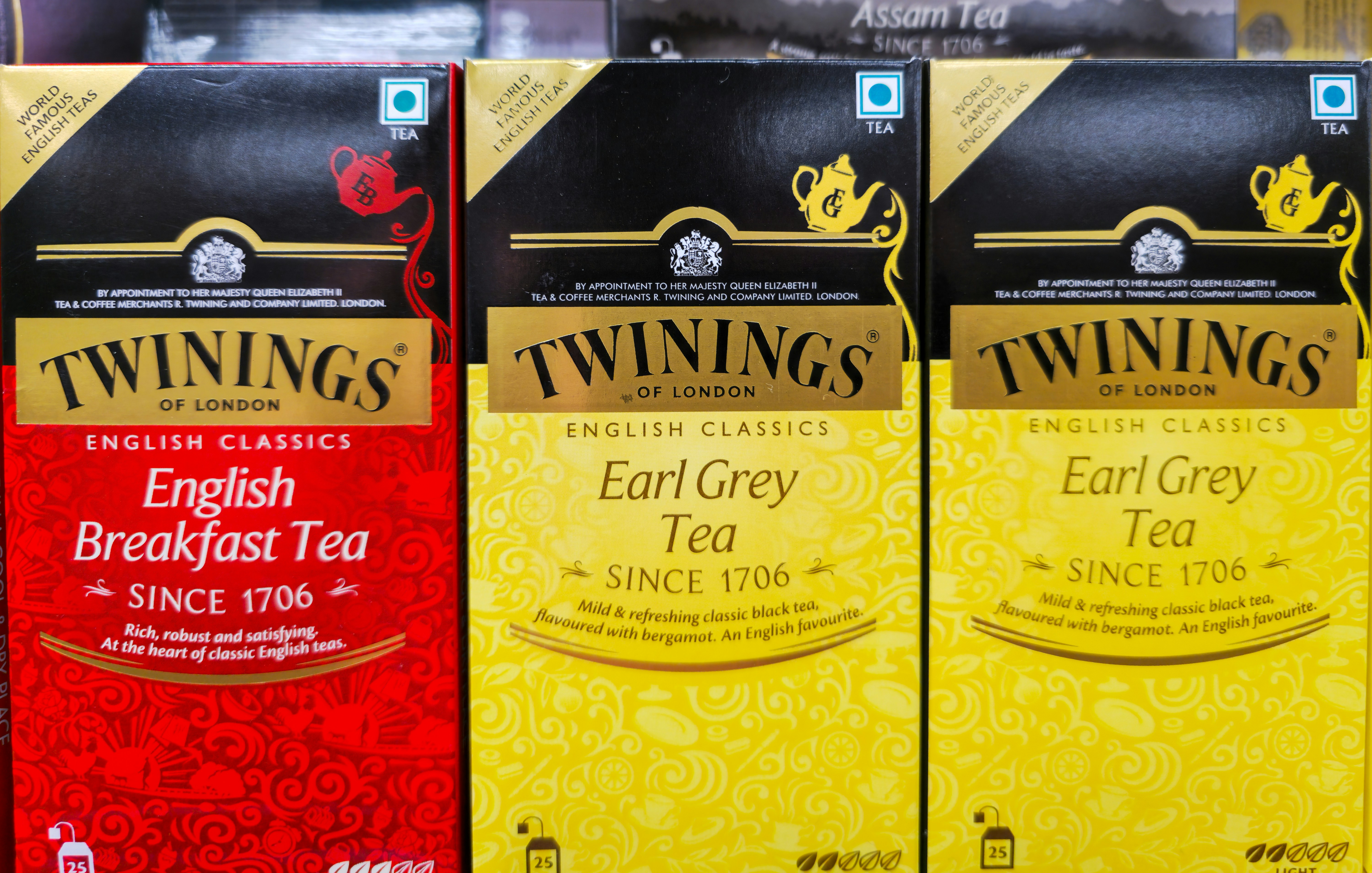 Three boxes of twinings tea: english breakfast and earl grey.