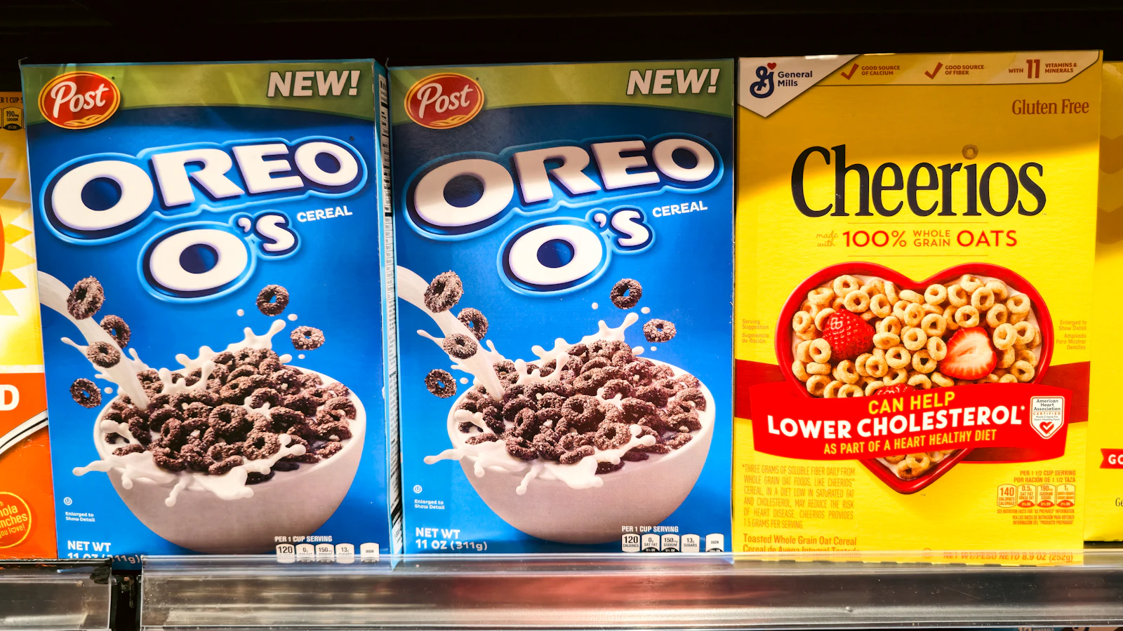 Rows of cereal boxes on a supermarket shelf competing for attention