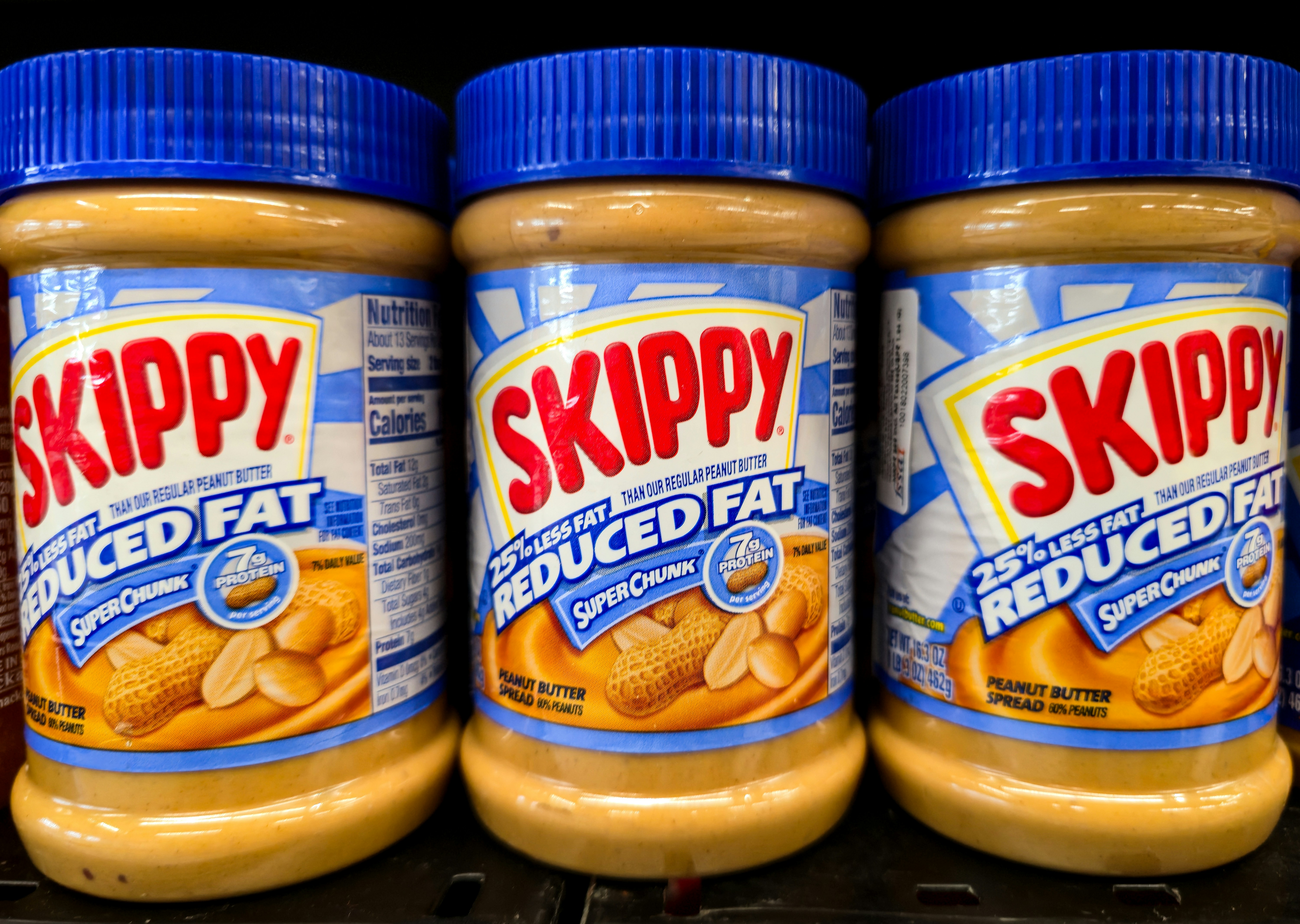 Peanut butter jars on shelf