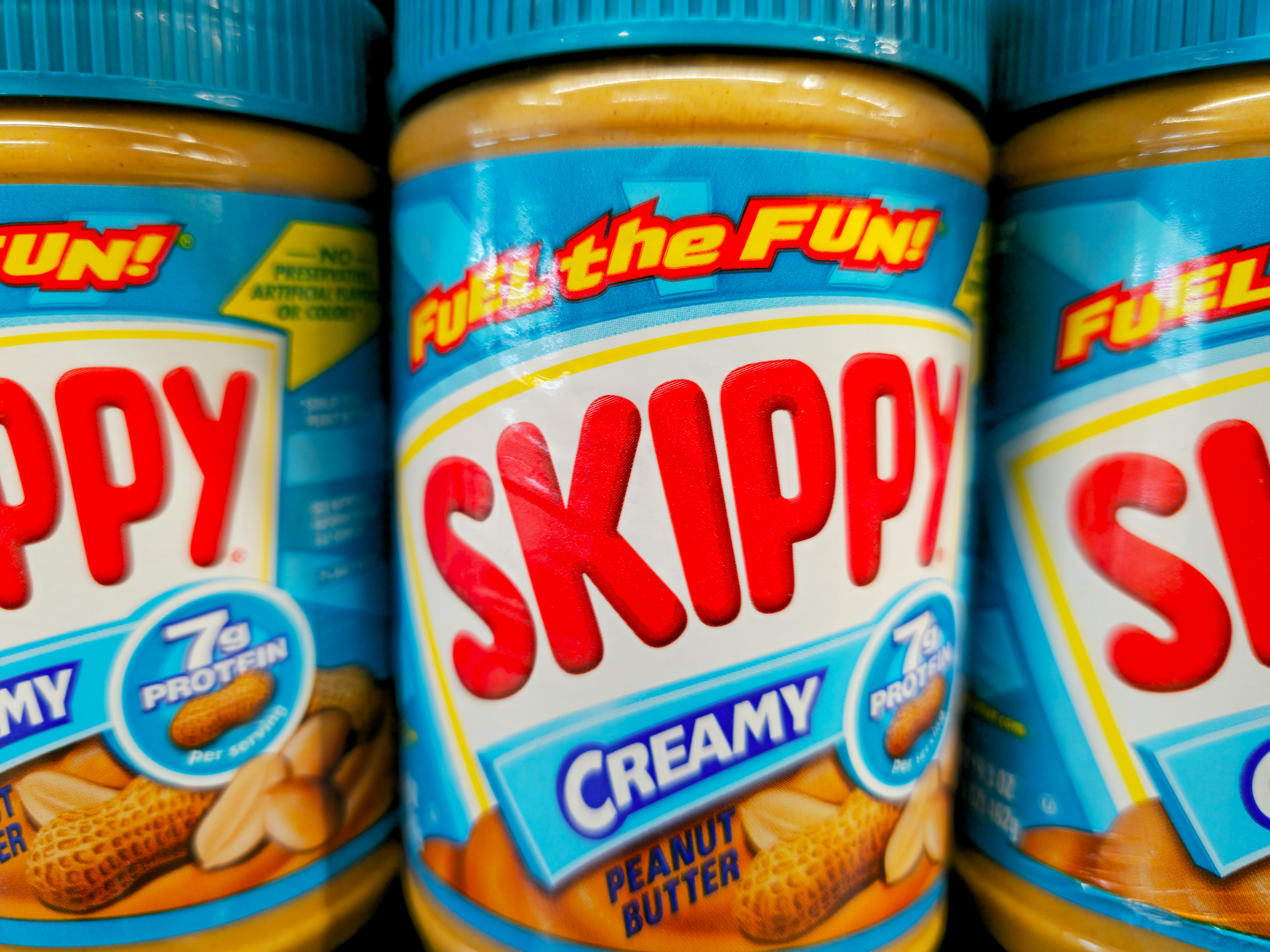 Peanut butter jars on shelf