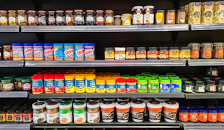 Shelves stocked with various spices and seasonings.