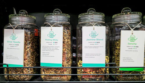 Glass jars filled with dried herbs