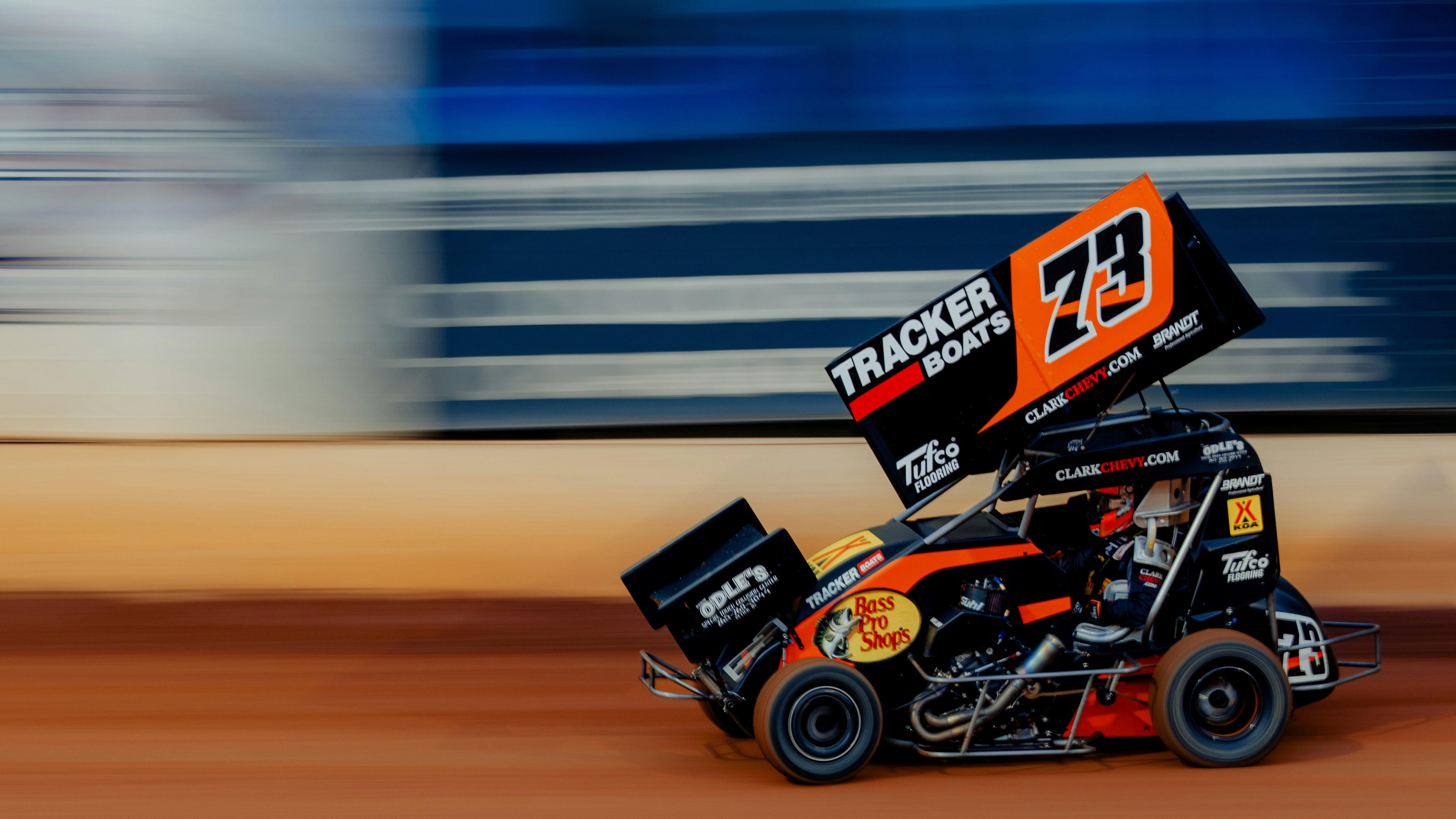 Sprint car racing on a dirt track with motion blur photo – Free Image ...