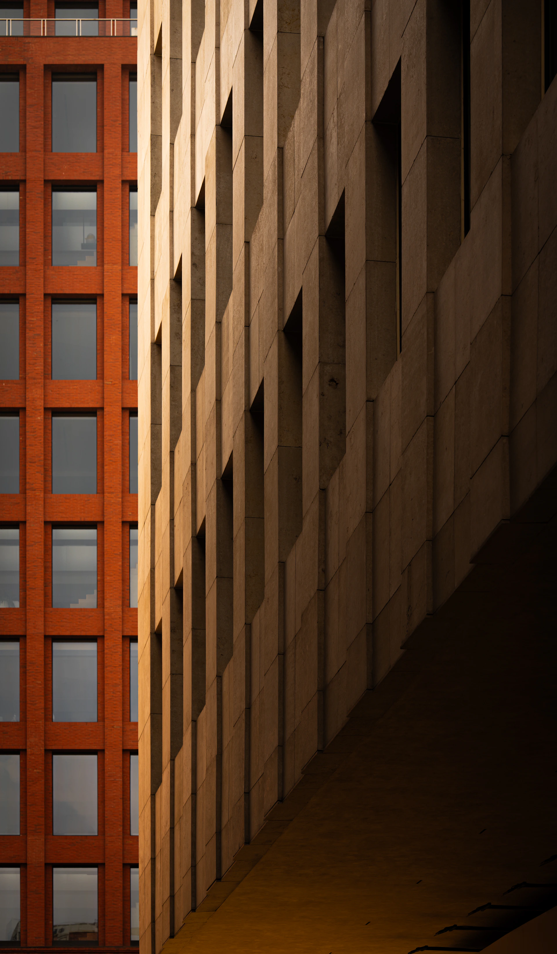 Modern buildings with geometric patterns and shadows