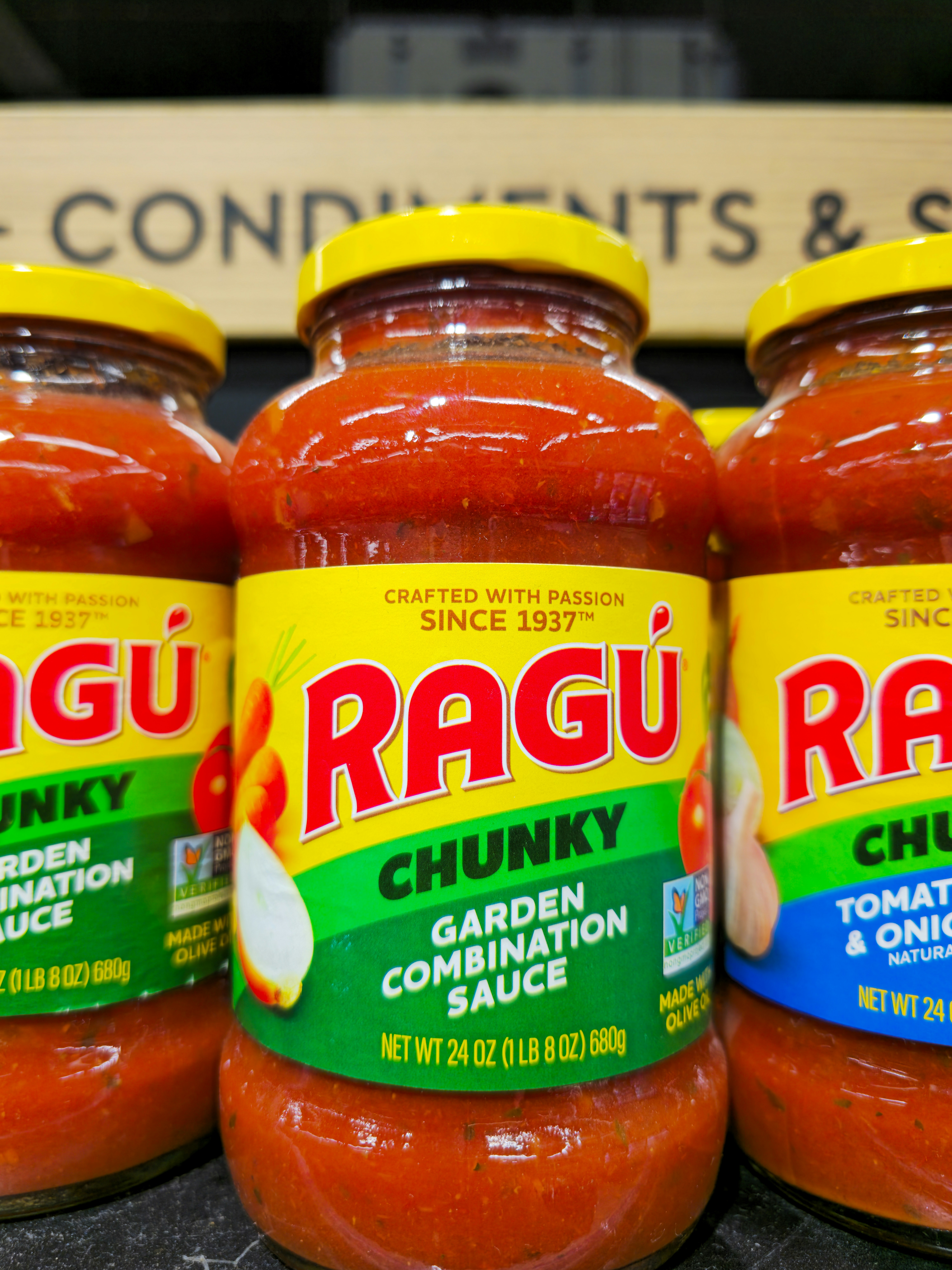 Three jars of ragu chunky garden combination sauce.