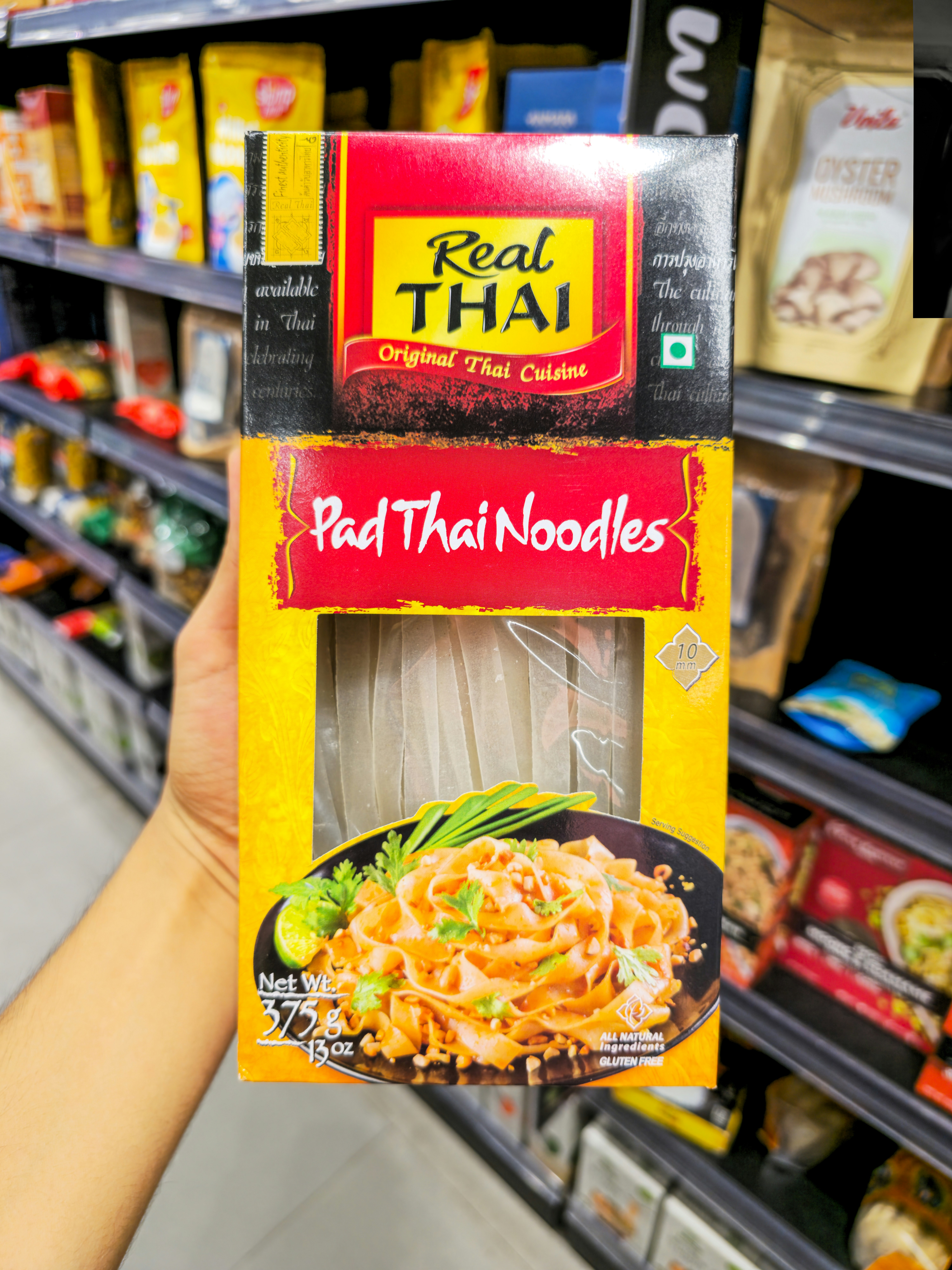 Box of real thai pad thai noodles with prepared dish