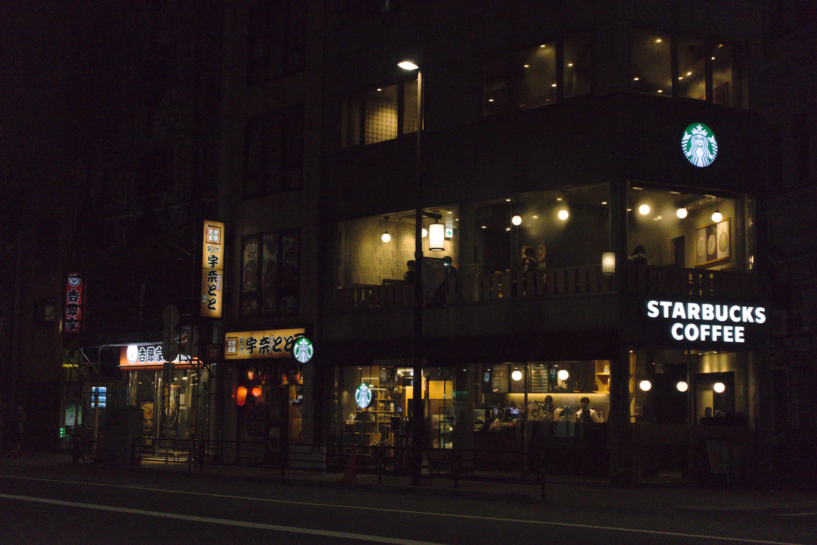 Atmospheric Tokyo cafe at dawn — the city before it wakes