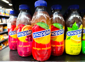 Bottles of snapple juice on a shelf