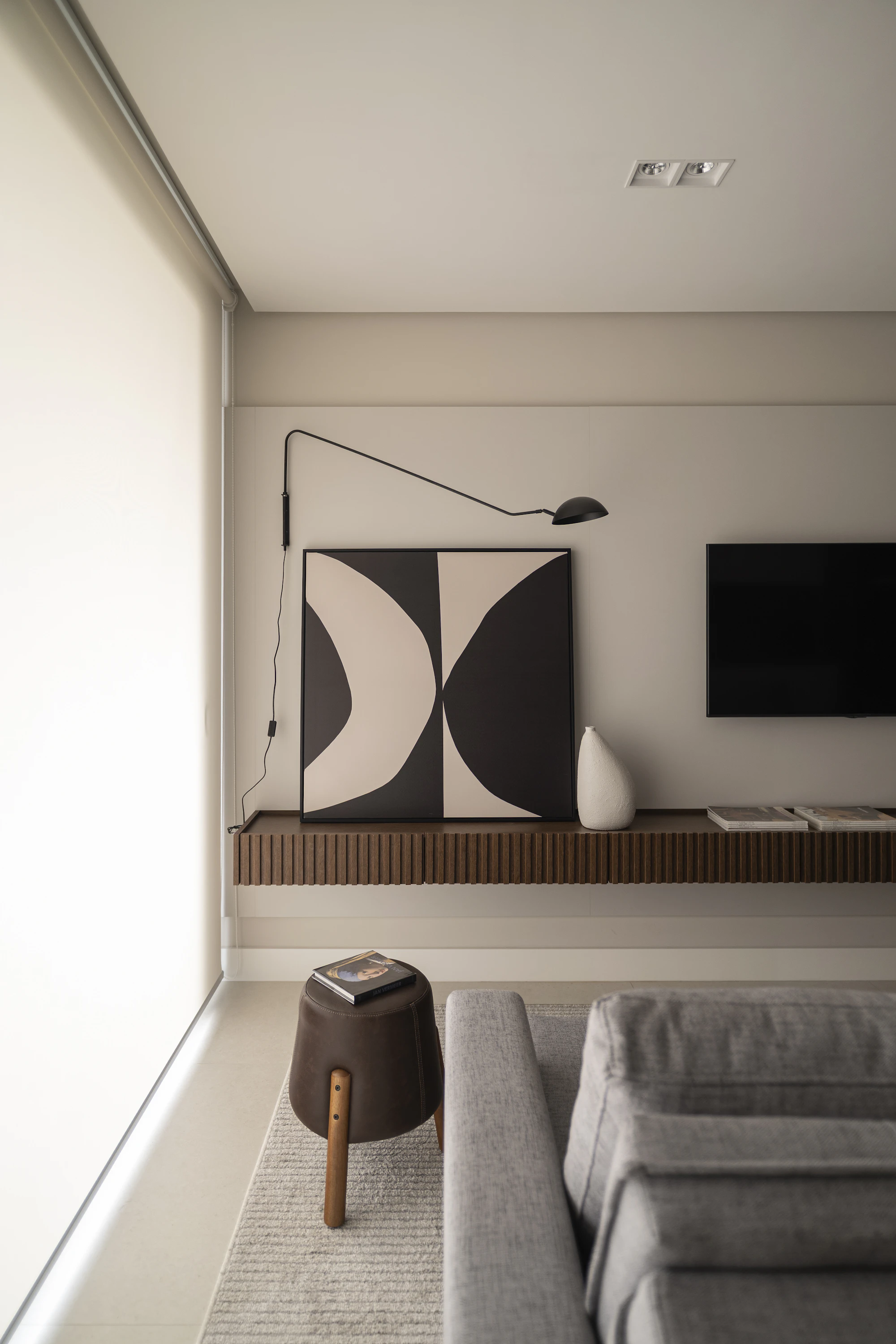 Warm modern living room with furniture, natural materials, and decorative accents