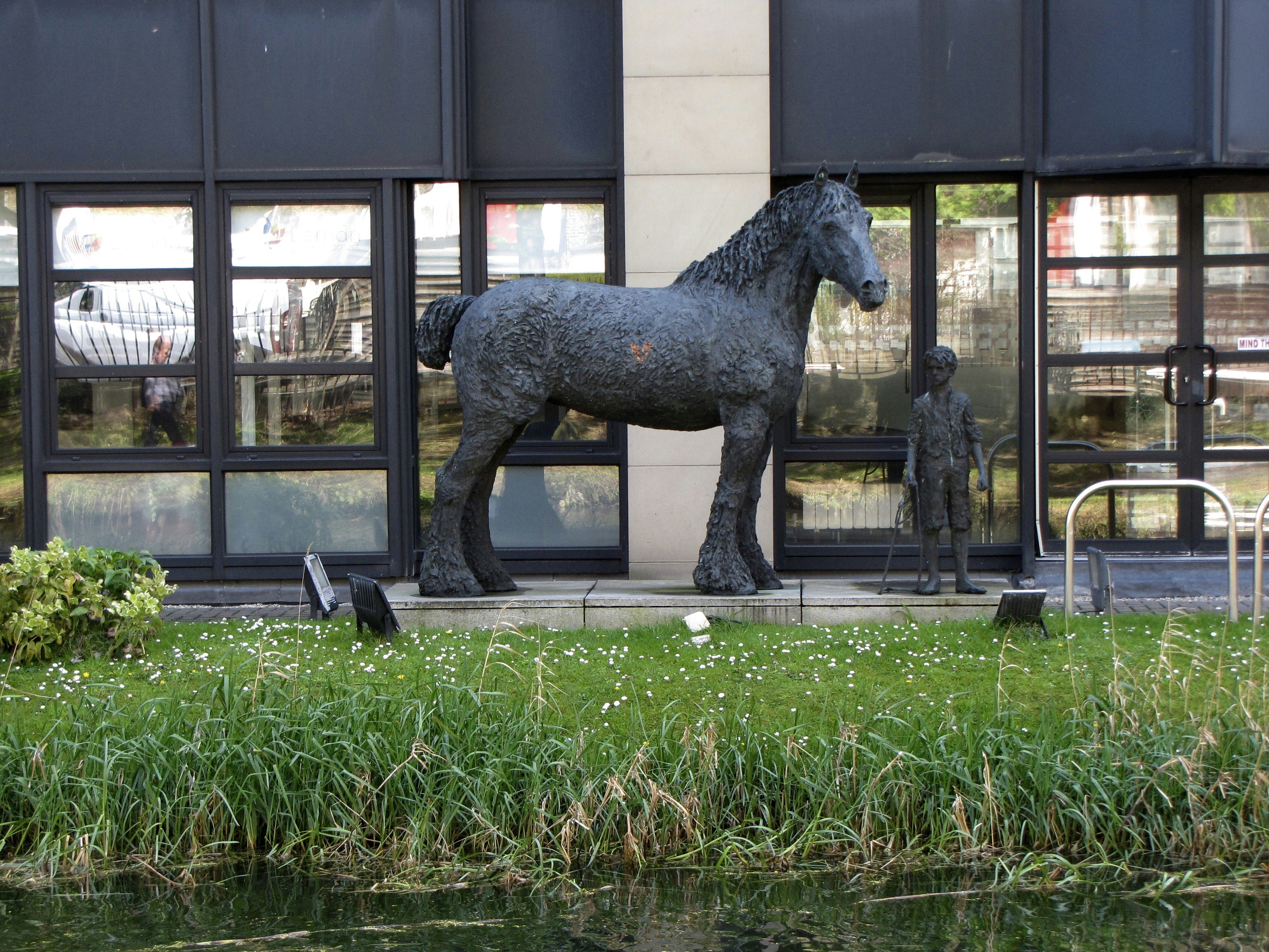 Canal office with horse sculpture