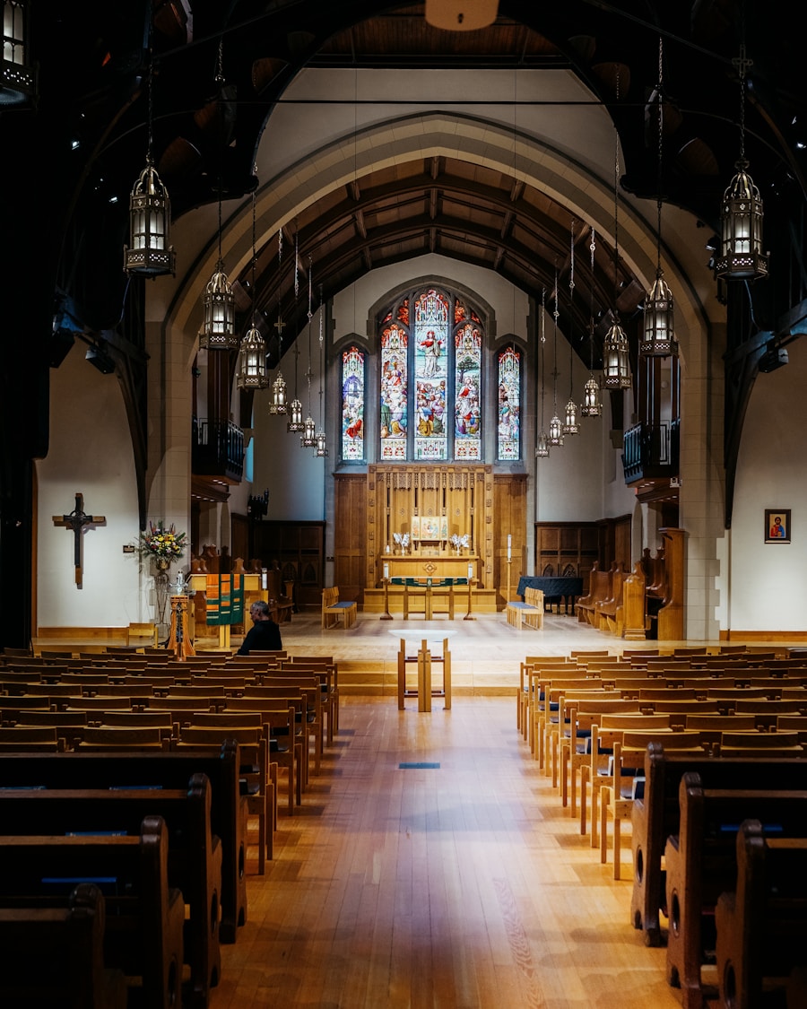 Church interior with pews and stained glass