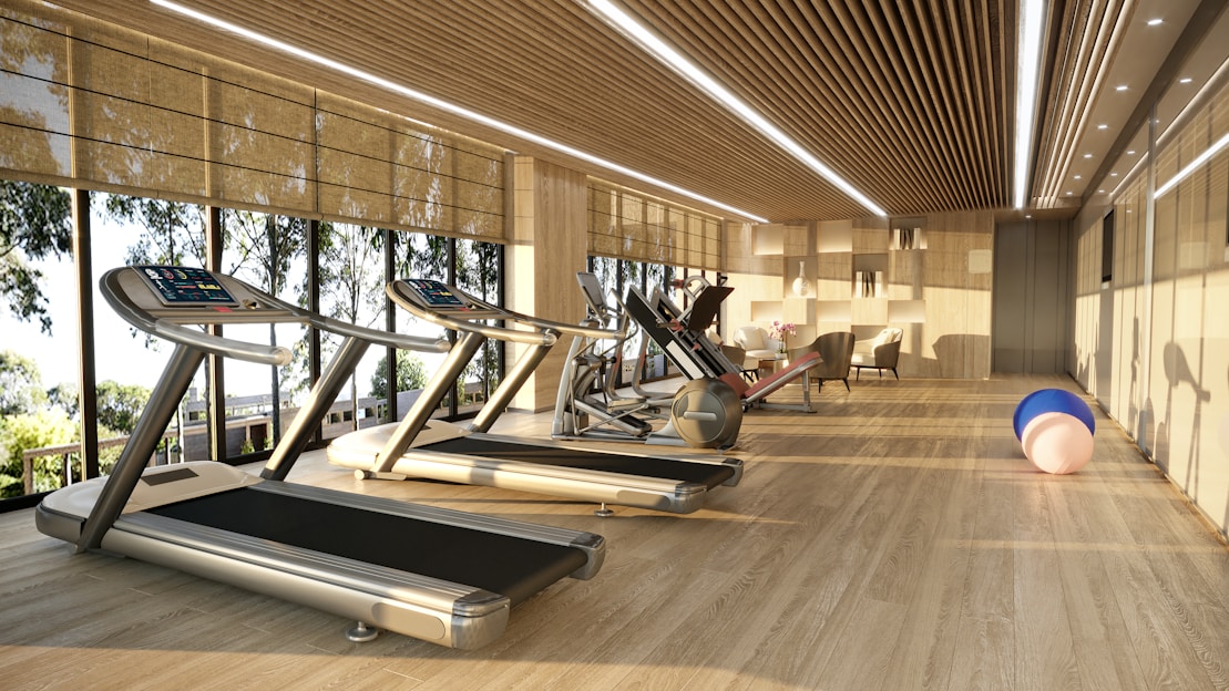 Modern gym with treadmills and large windows