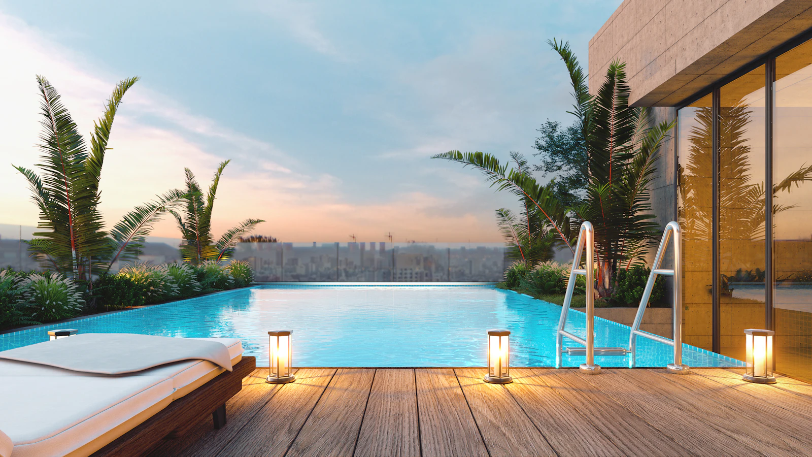Rooftop pool with lounge chair at sunset