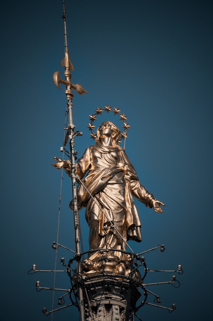 Students working together with laptops in modern classroom