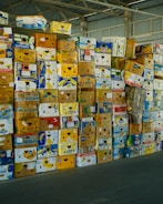 Stacks of cardboard boxes filled with bananas