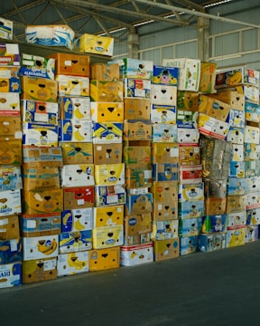 Stacks of cardboard boxes filled with bananas