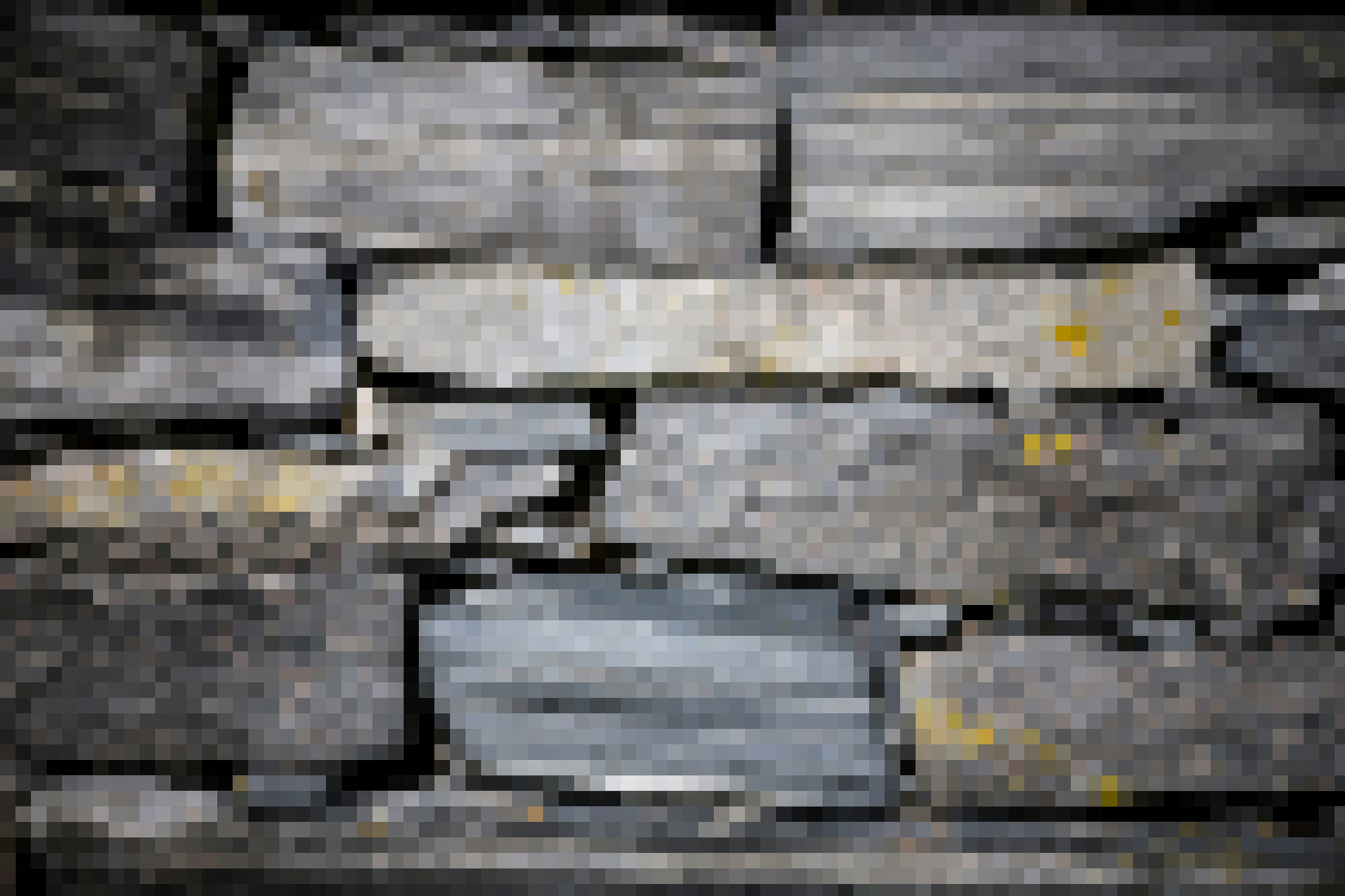 Rough stone wall with weathered texture