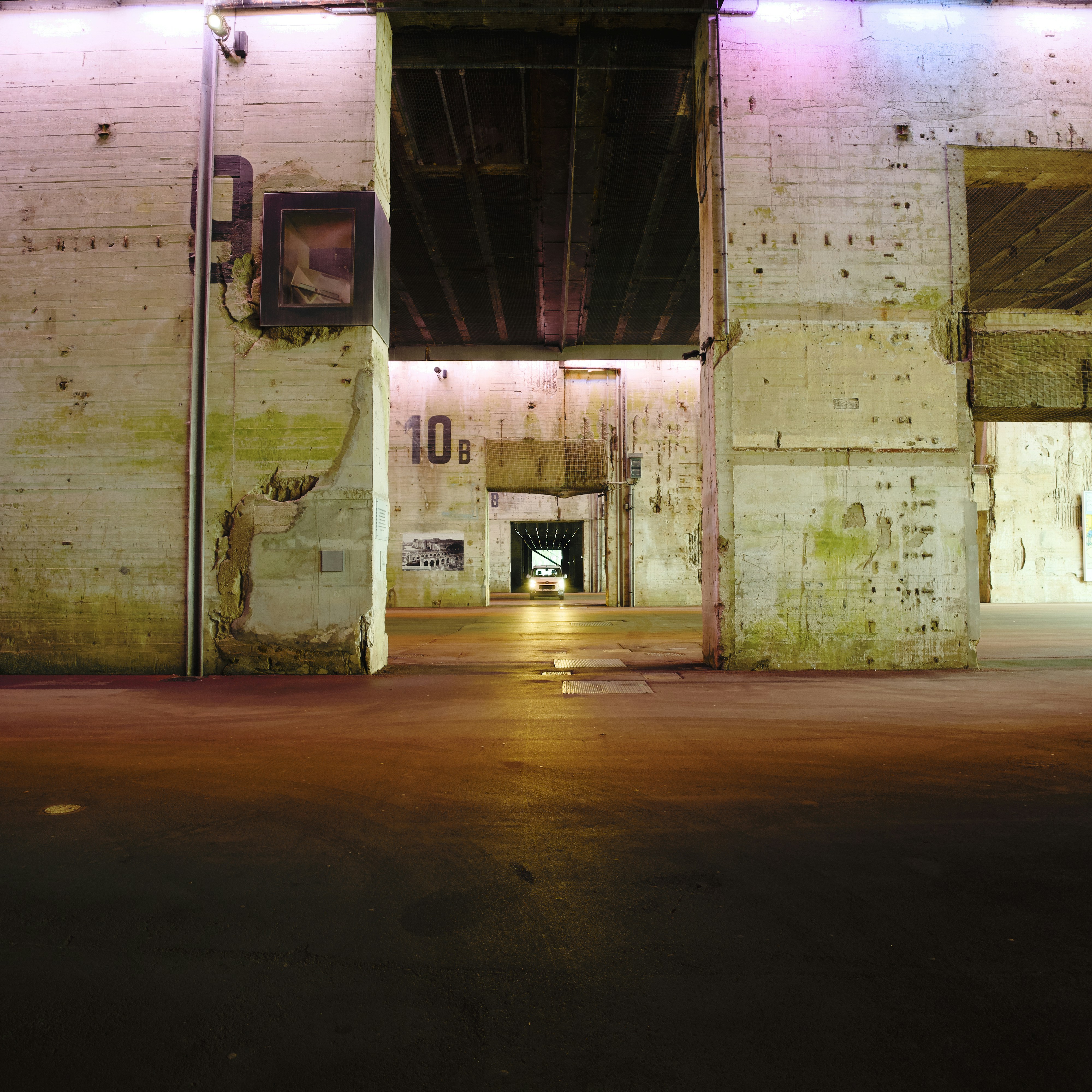 Industrial building interior with concrete walls and lighting