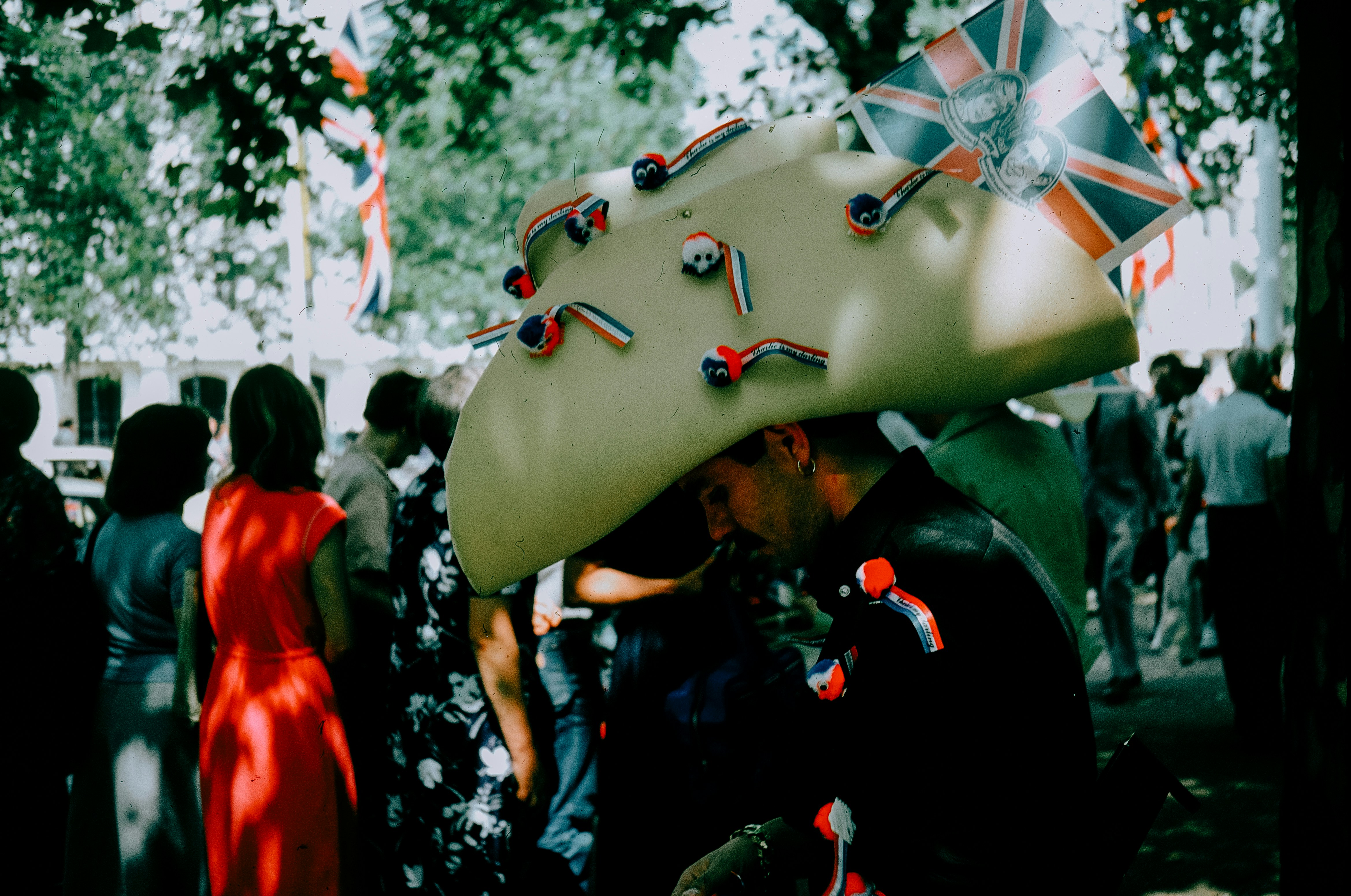 Graduating students celebrating with their caps thrown in the air in The Woodlands, Texas