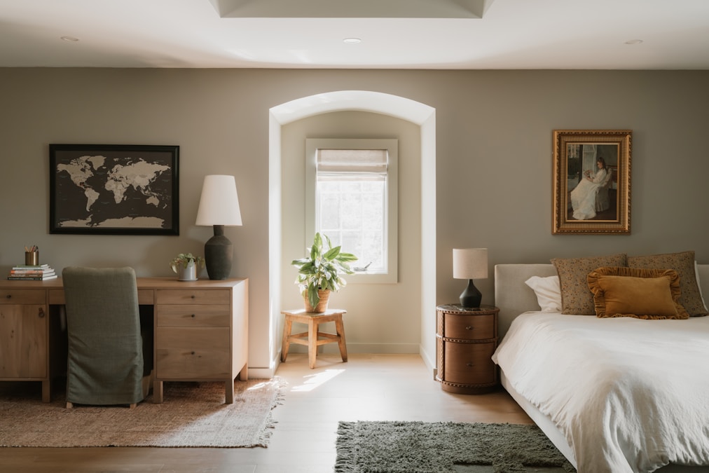 Bright dorm-style room with desk and bed — Baylor freshman housing