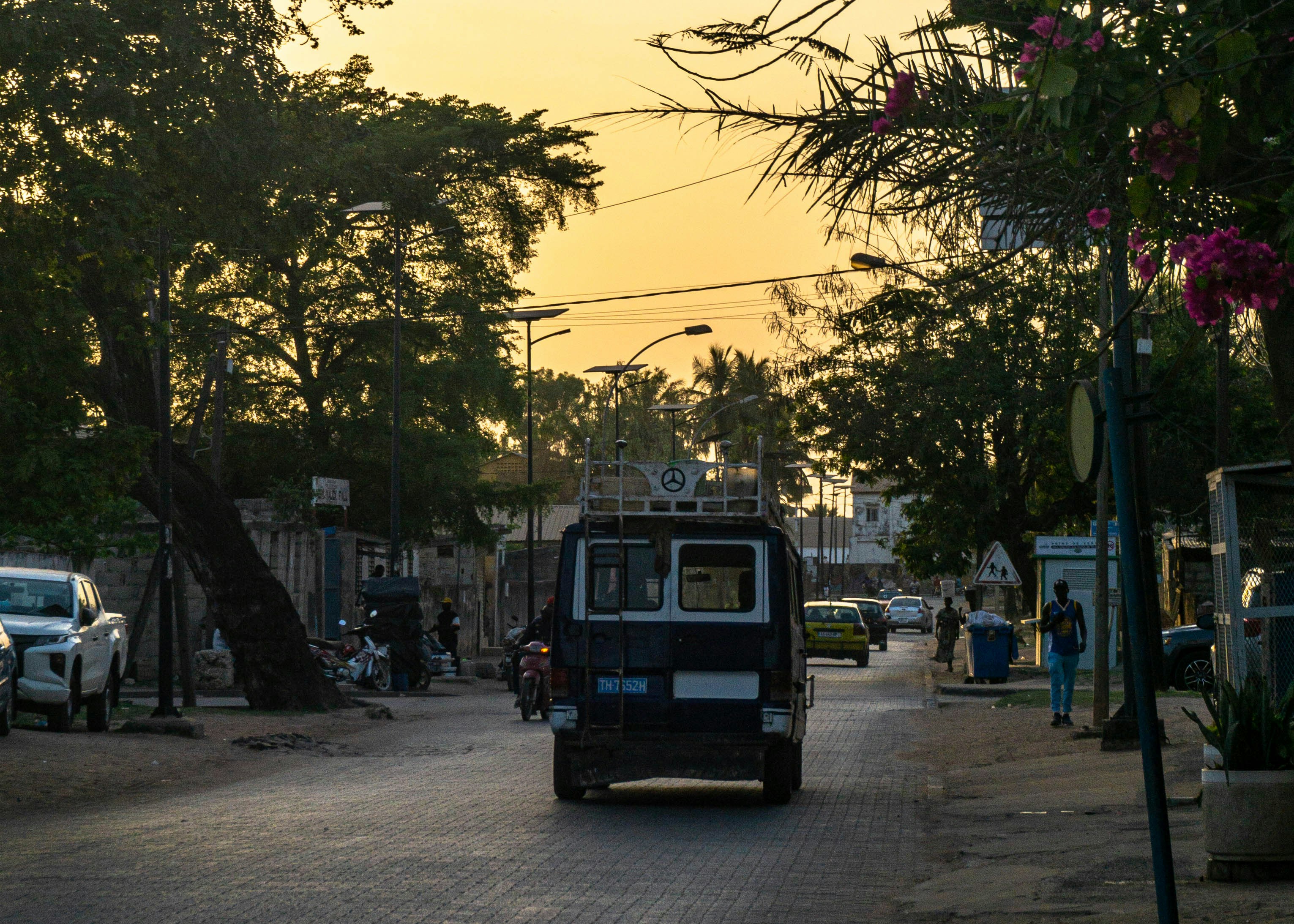 Bus leading into the city centre of Ziguinchor in the evening.