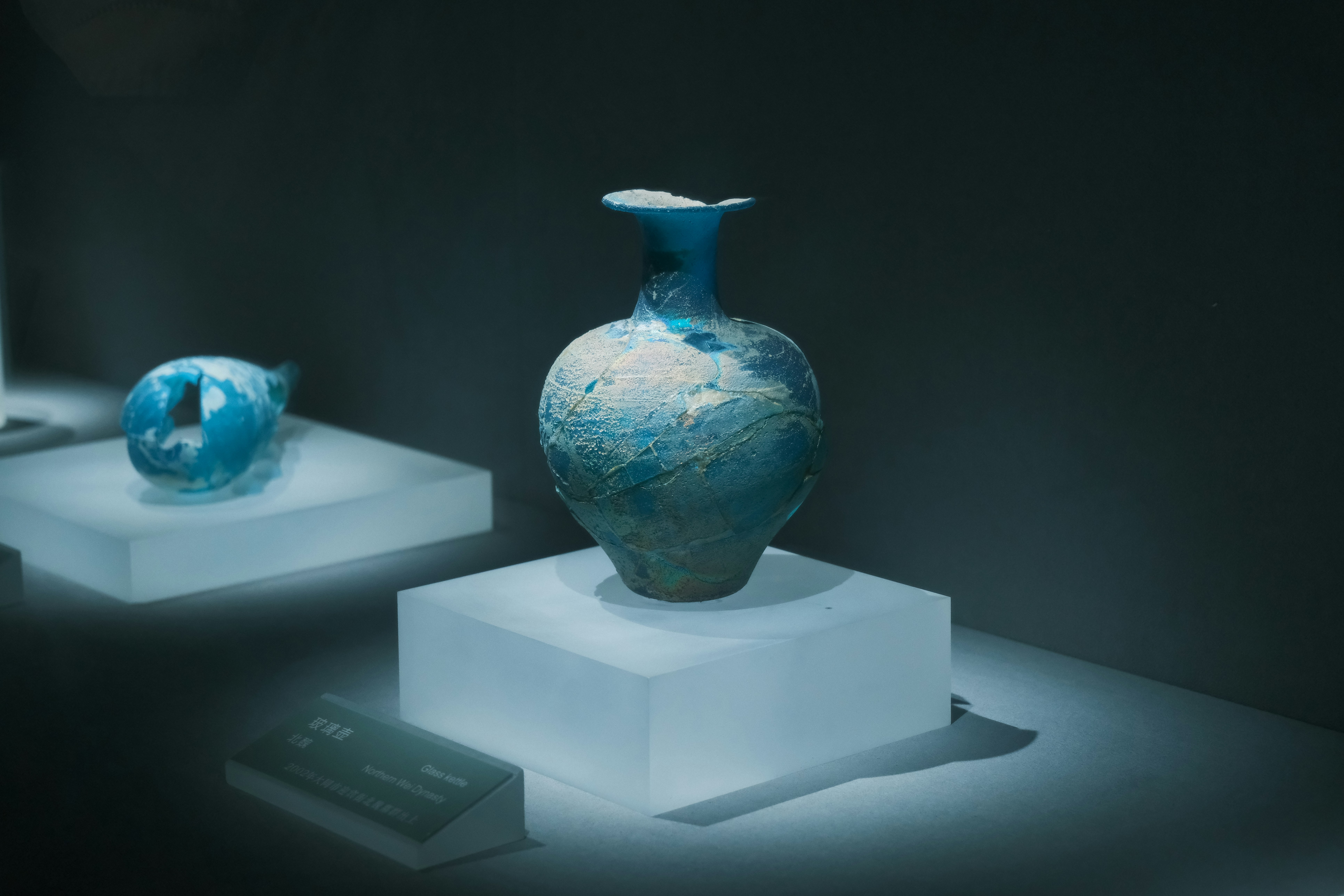 Ancient blue ceramic vase on display