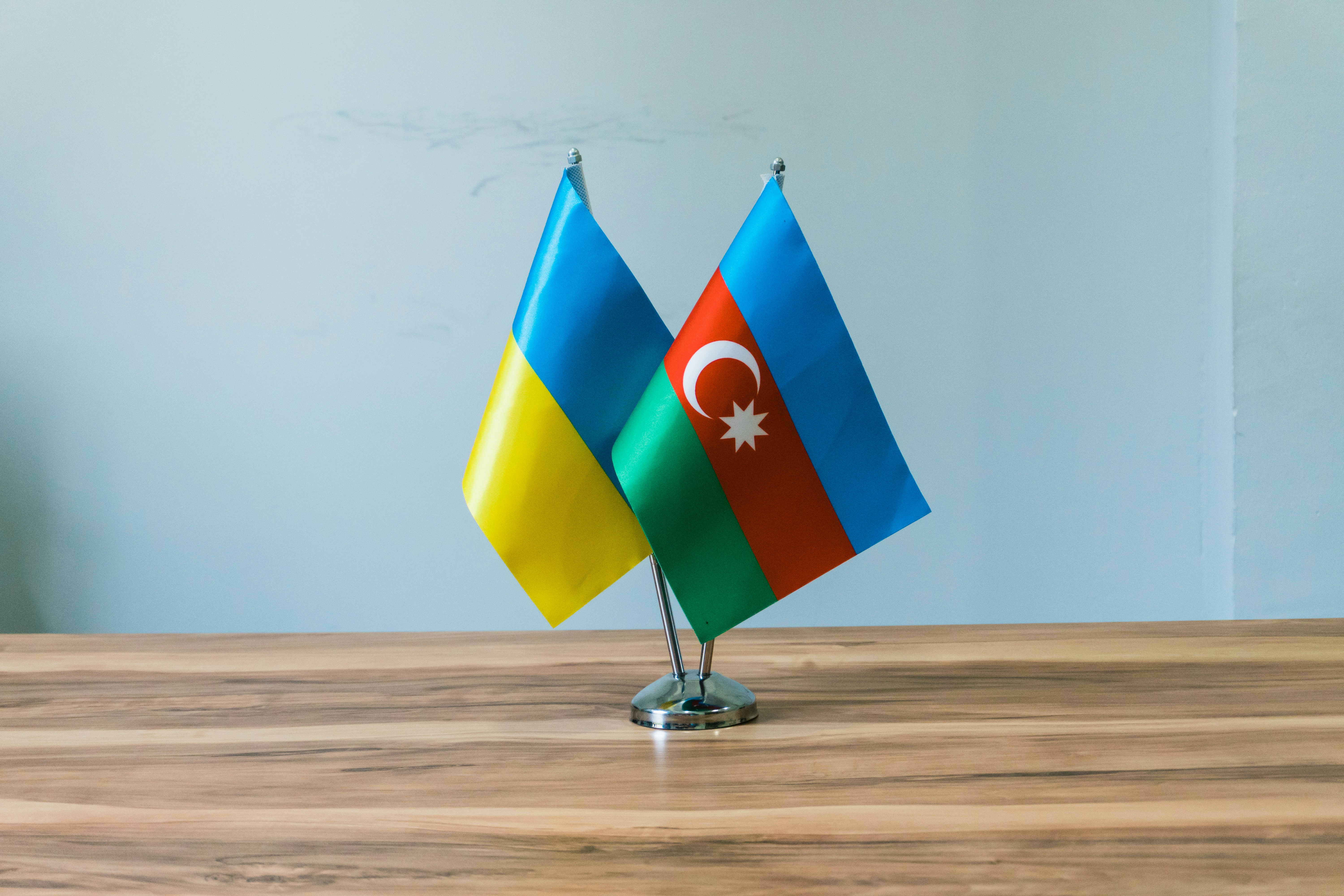 Flags of ukraine and azerbaijan side by side.