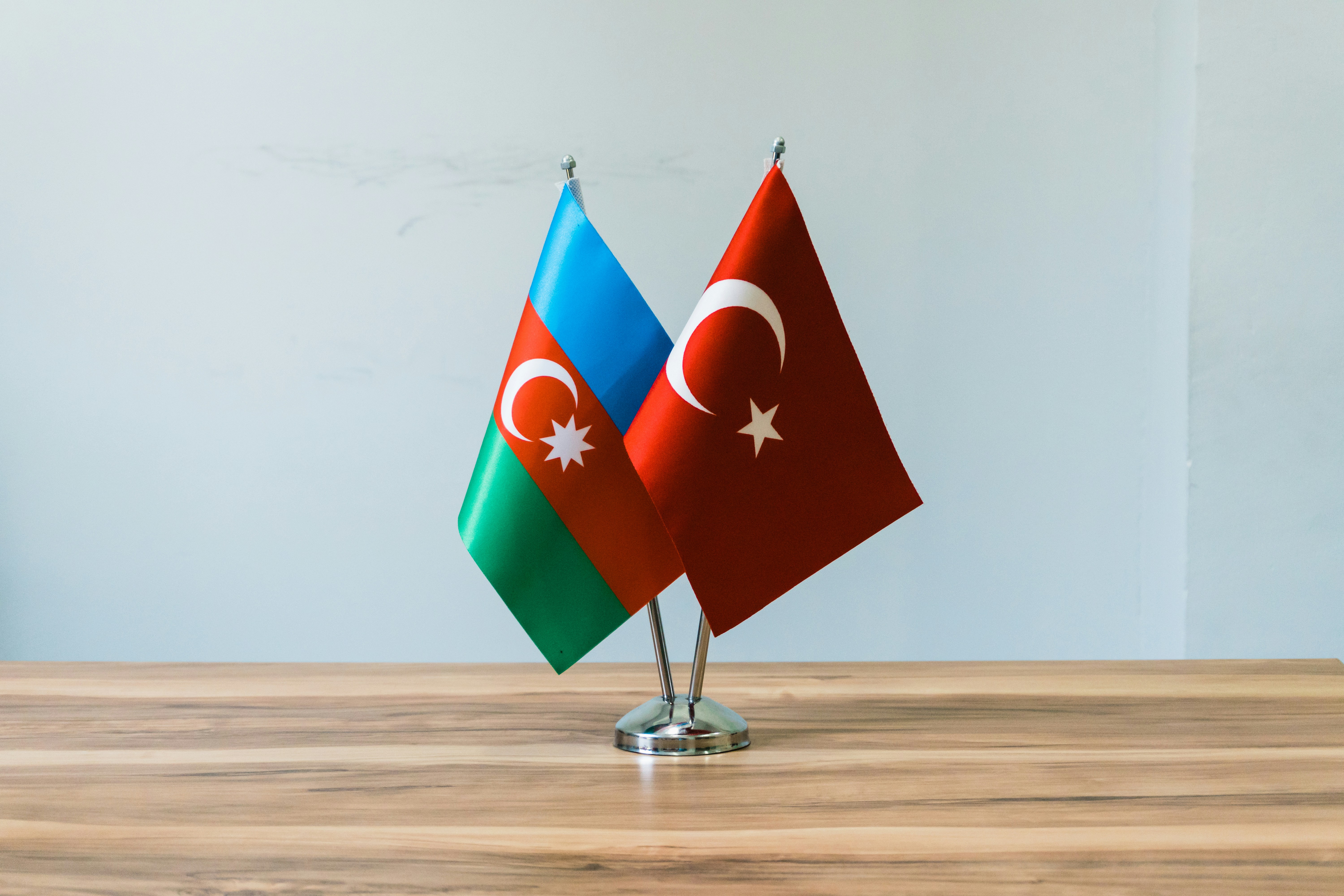 Azerbaijan and turkey flags on a table
