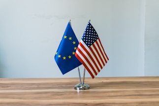 European union and us flags on a table