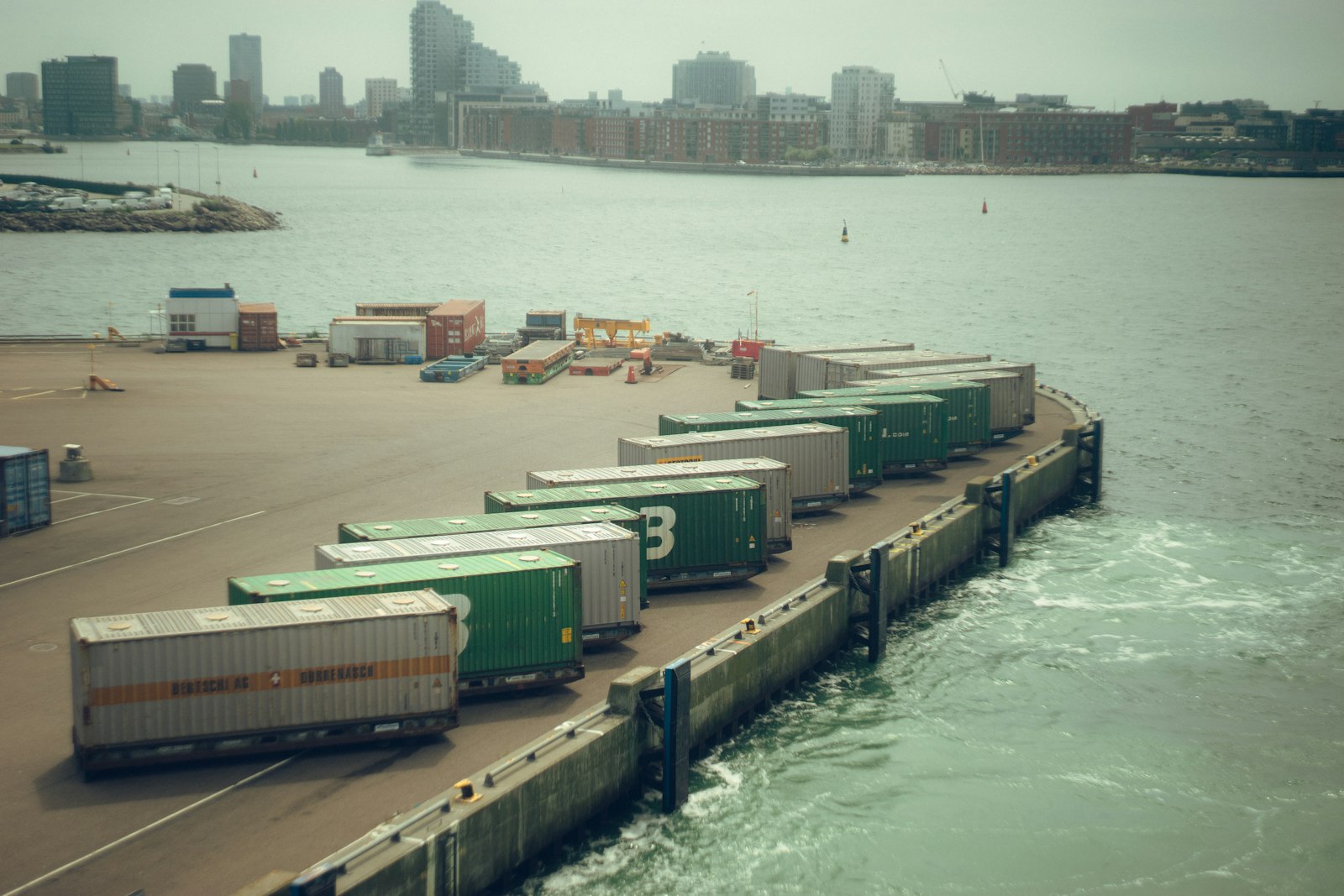 Shipping containers at port, representing export infrastructure