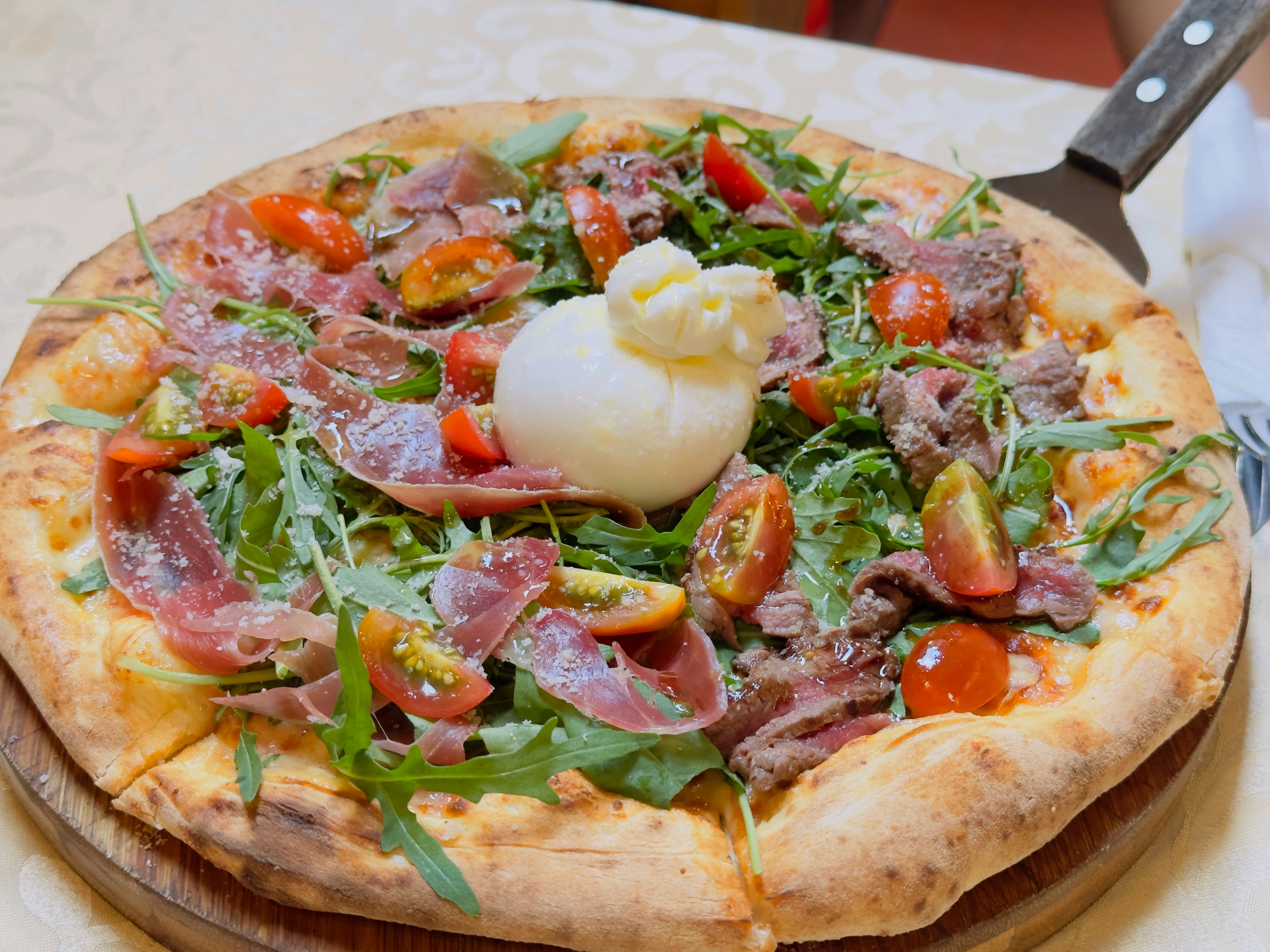 Gourmet pizza with burrata